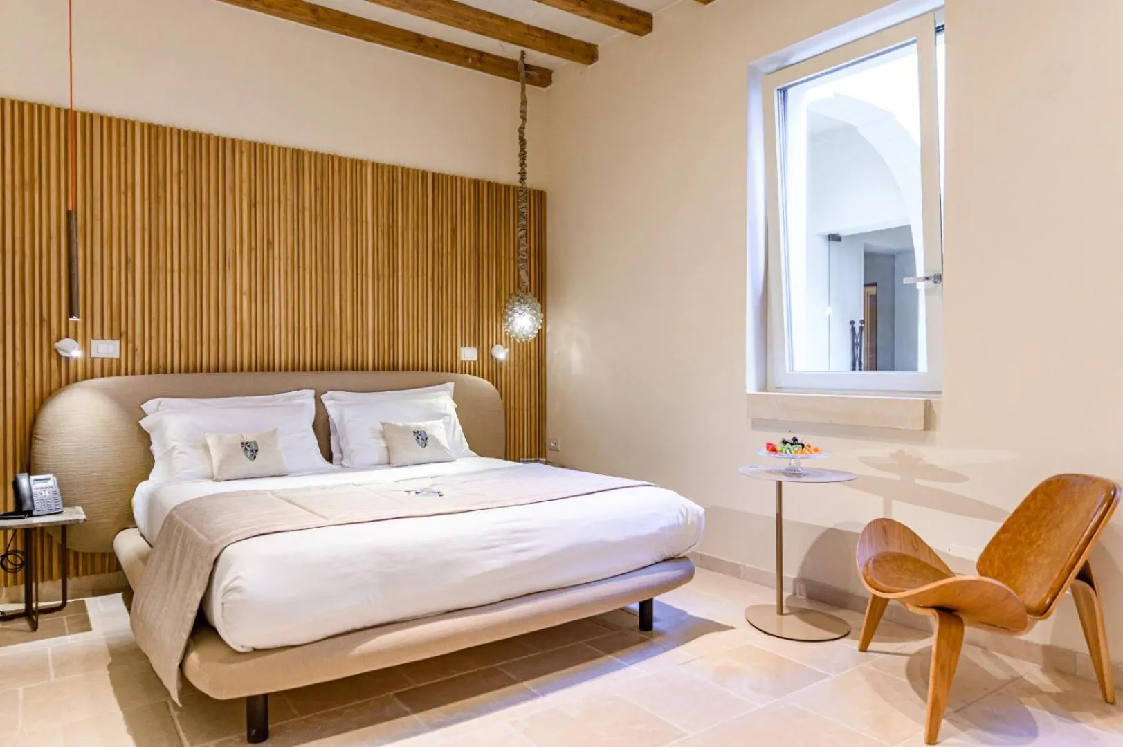 Bed in Pollicastro Boutique Hotel