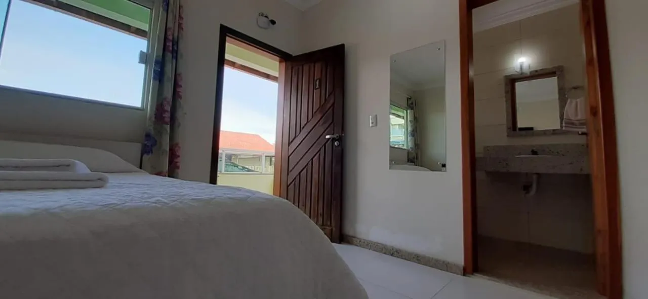 Bed in Pousada Maré Boa