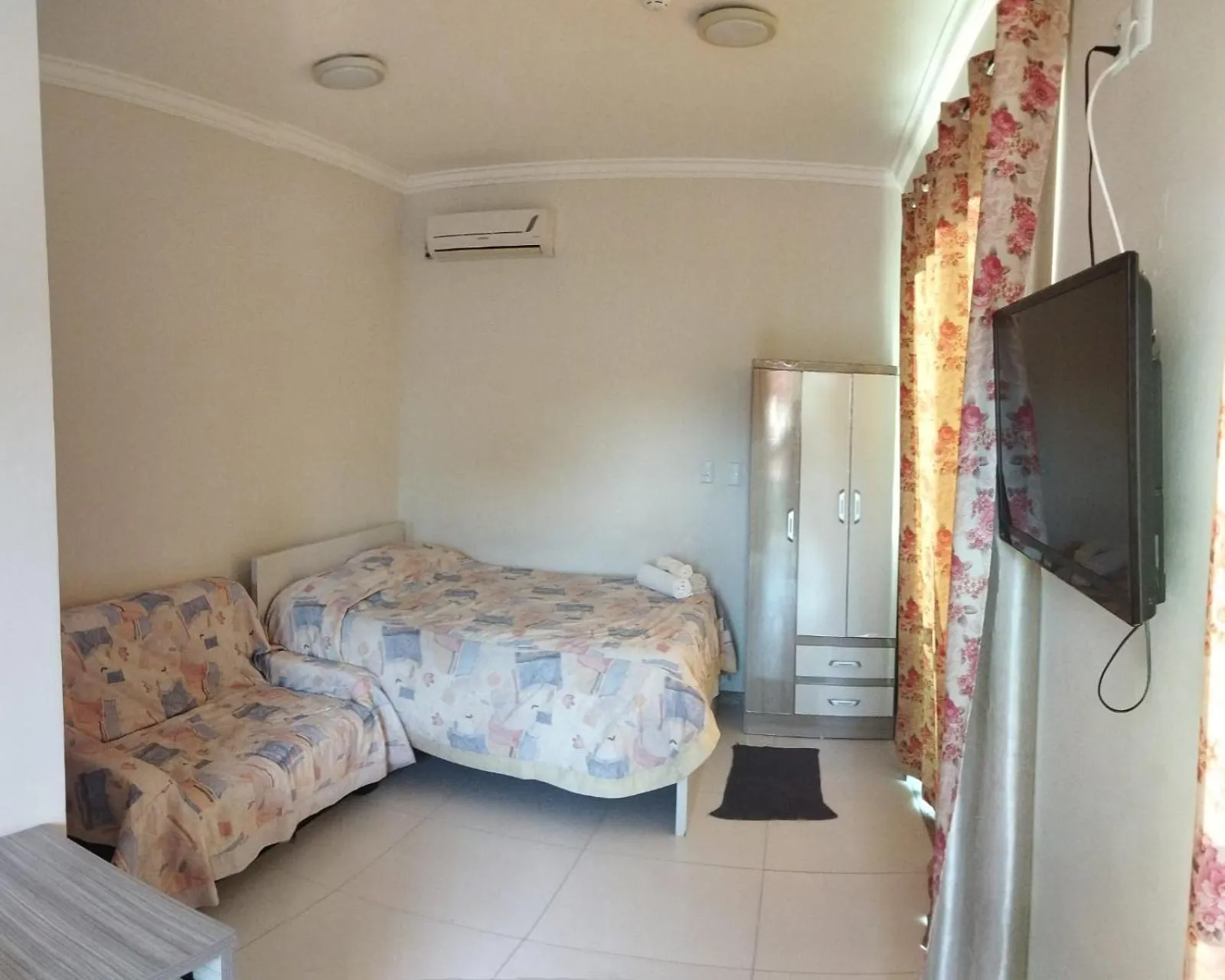 Bed in Pousada Maré Boa