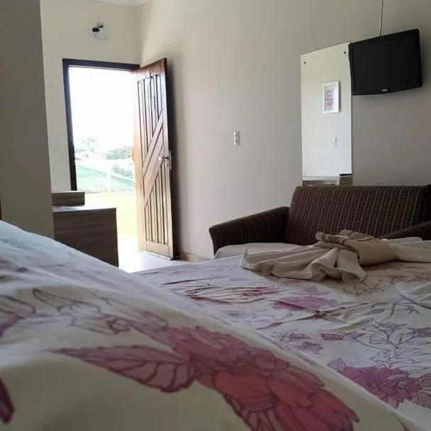 Bed in Pousada Maré Boa