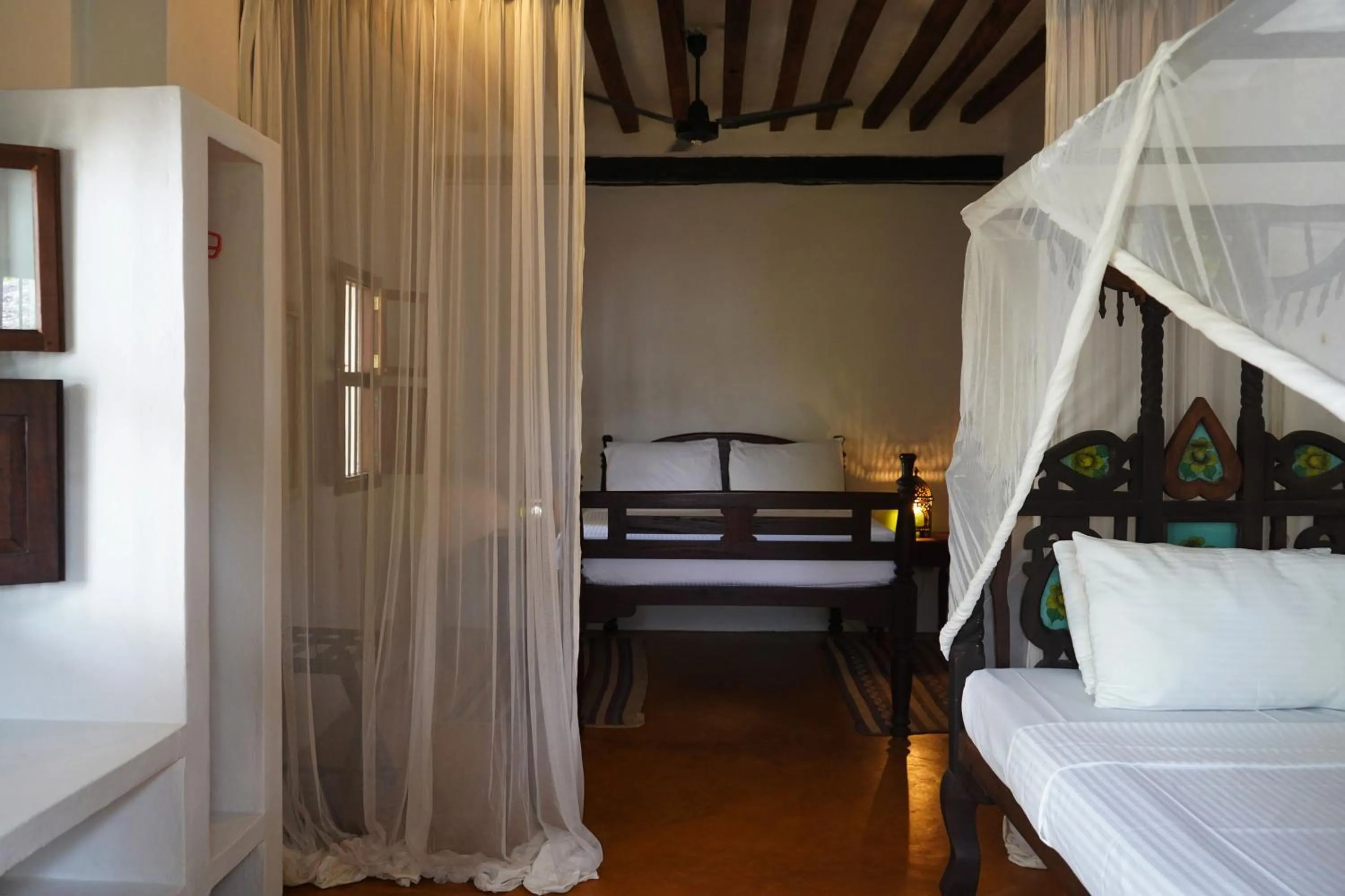Bed in Kijani Hotel