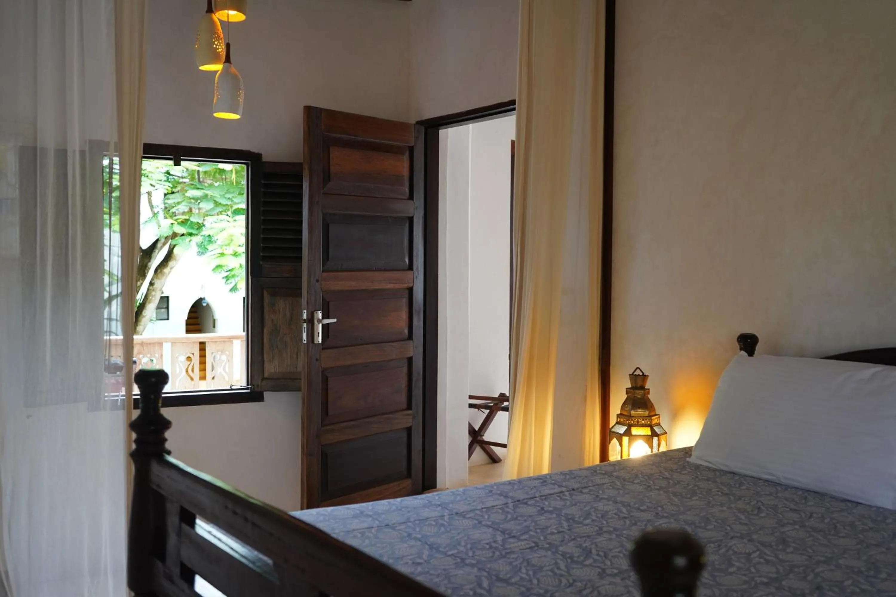Bed in Kijani Hotel