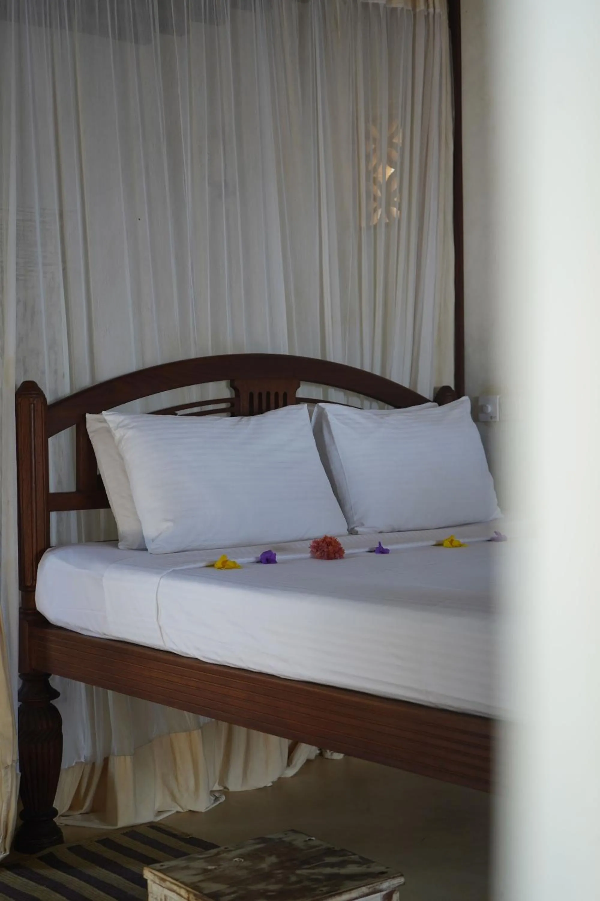 Bed in Kijani Hotel