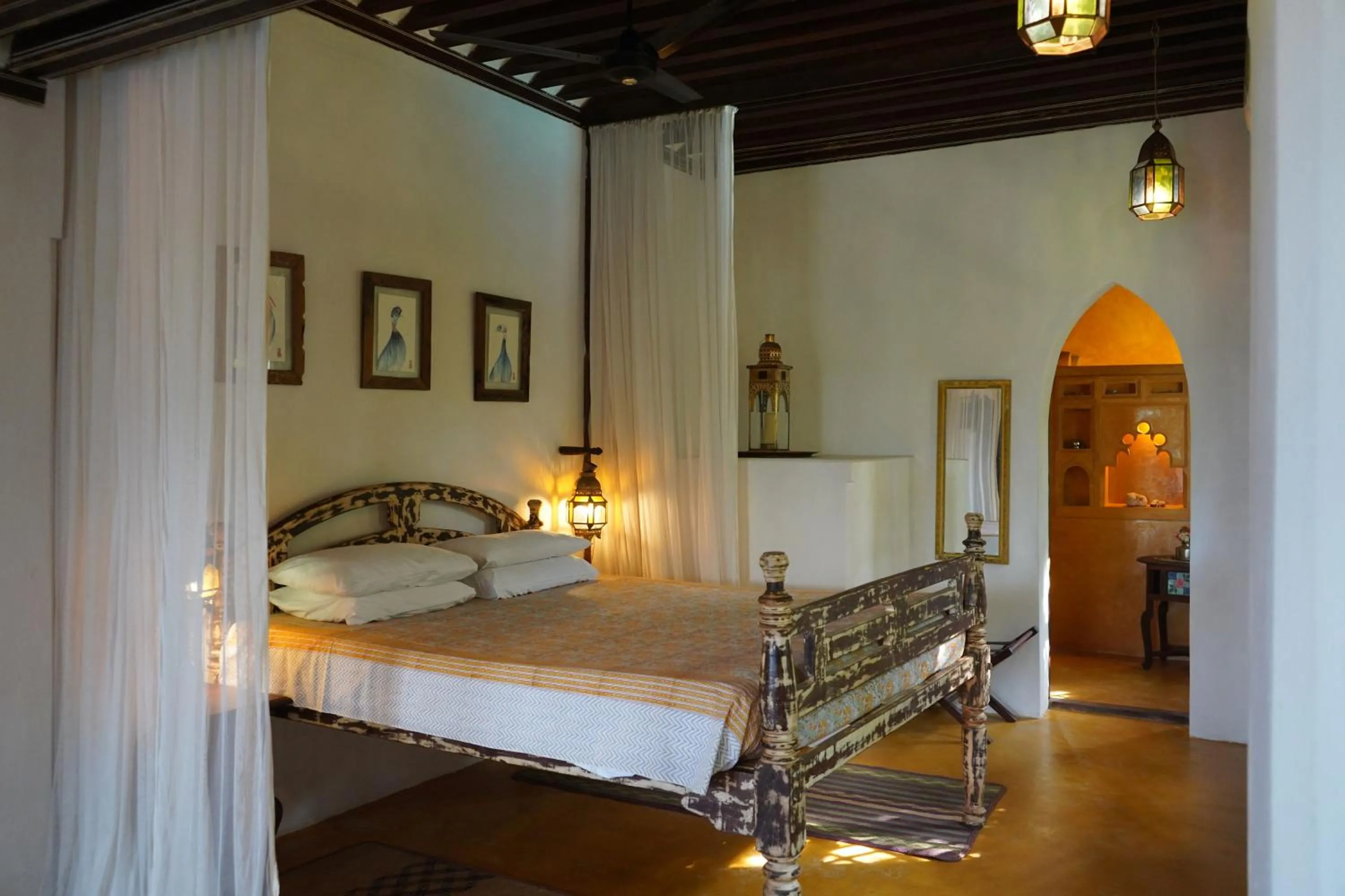 Bed in Kijani Hotel