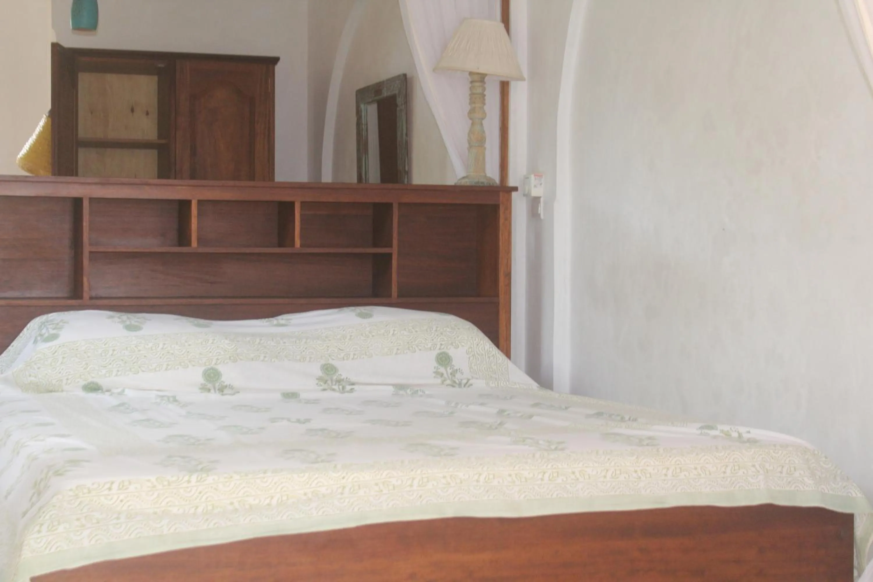 Bed in Kijani Hotel
