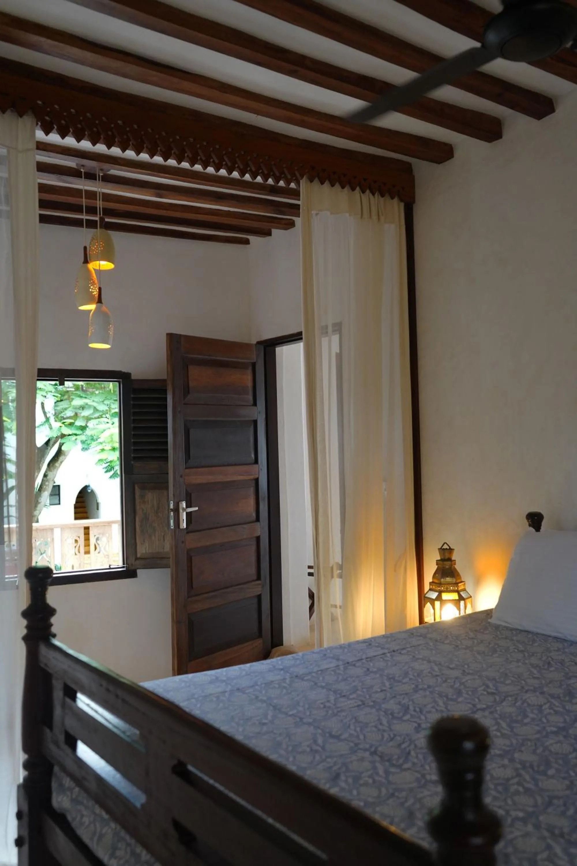 Bed in Kijani Hotel
