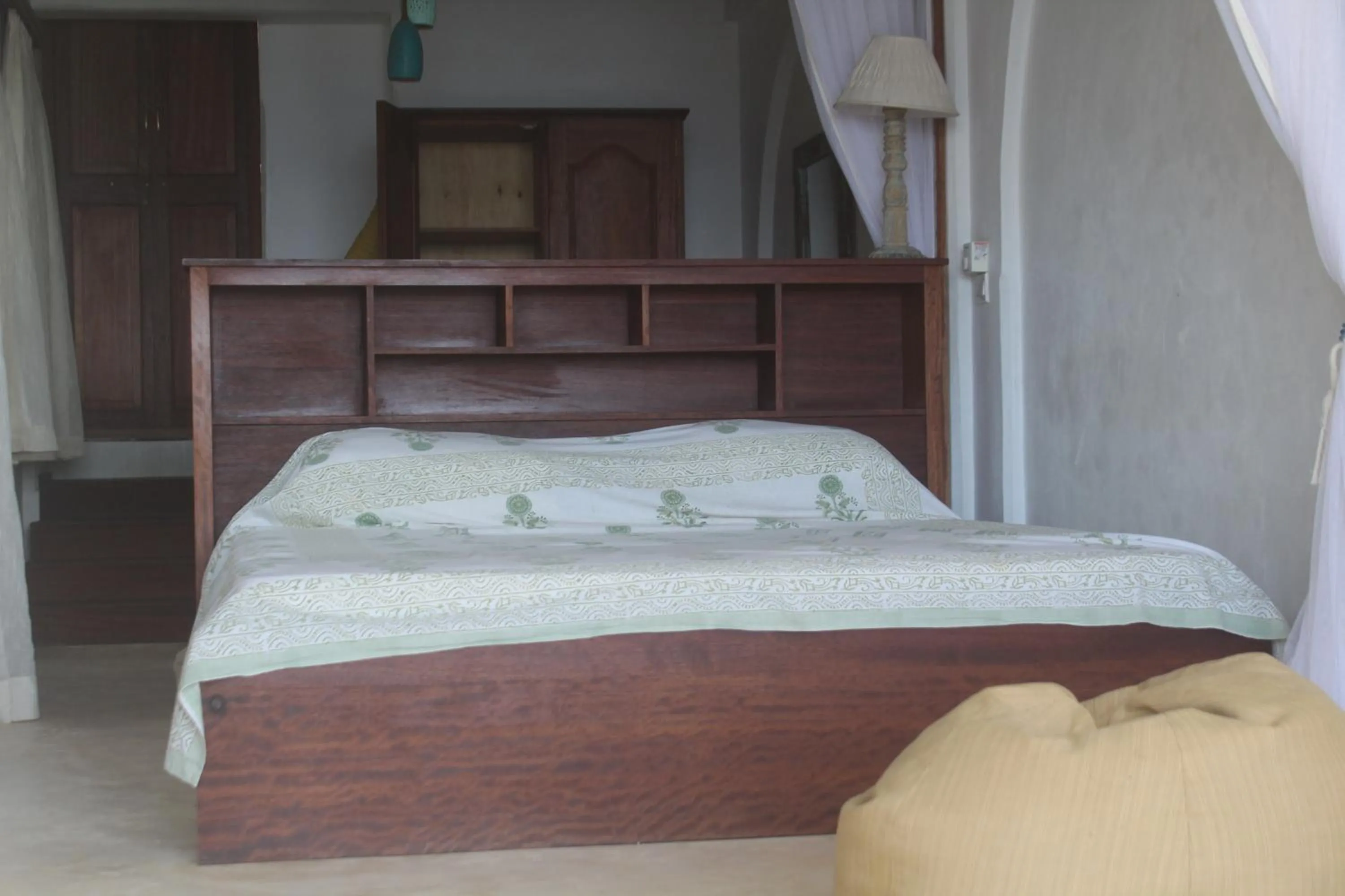 Bed in Kijani Hotel