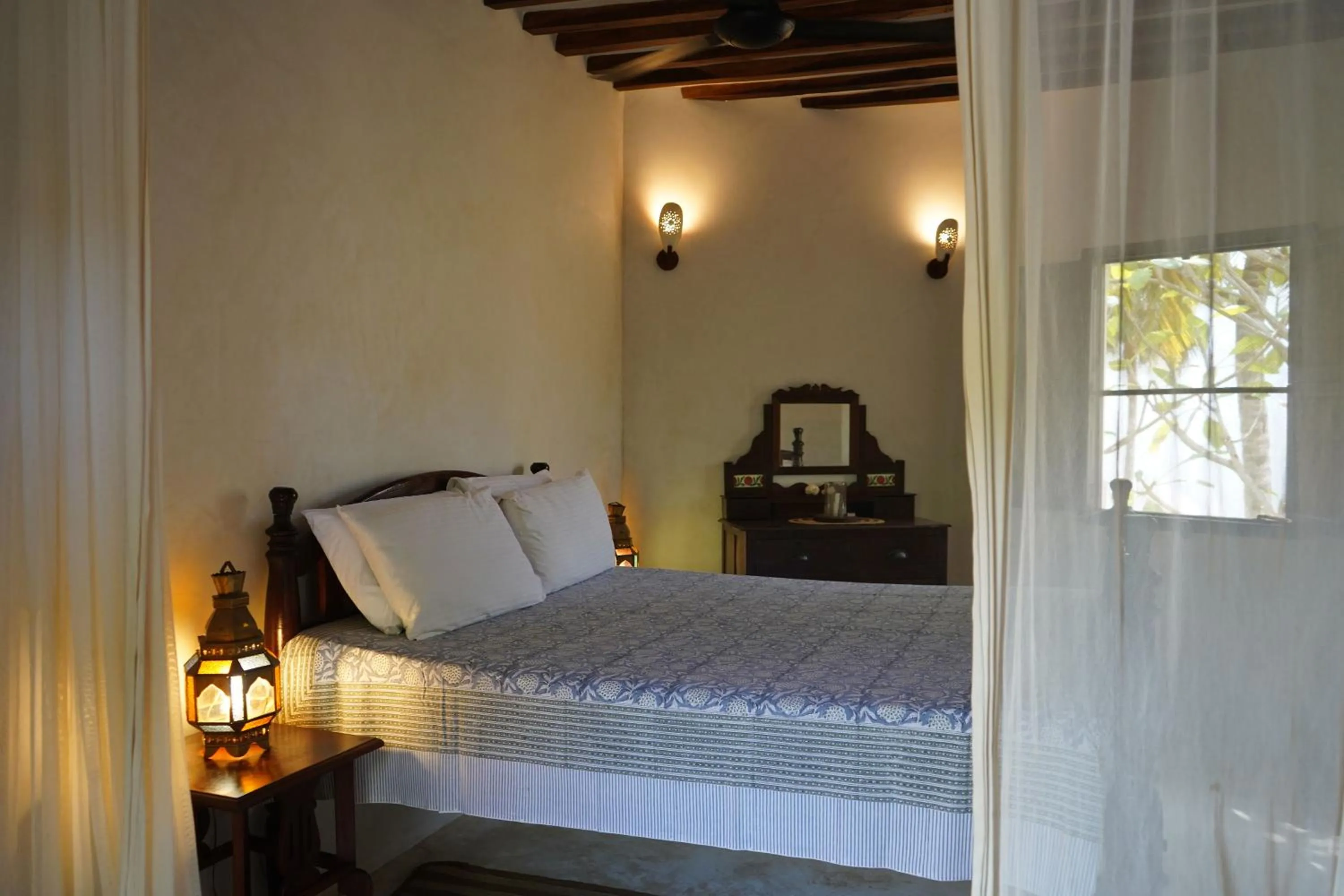 Bed in Kijani Hotel
