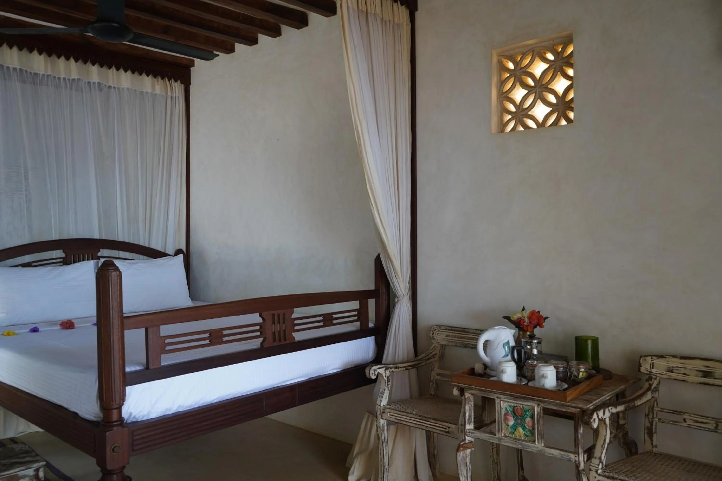 Bed in Kijani Hotel