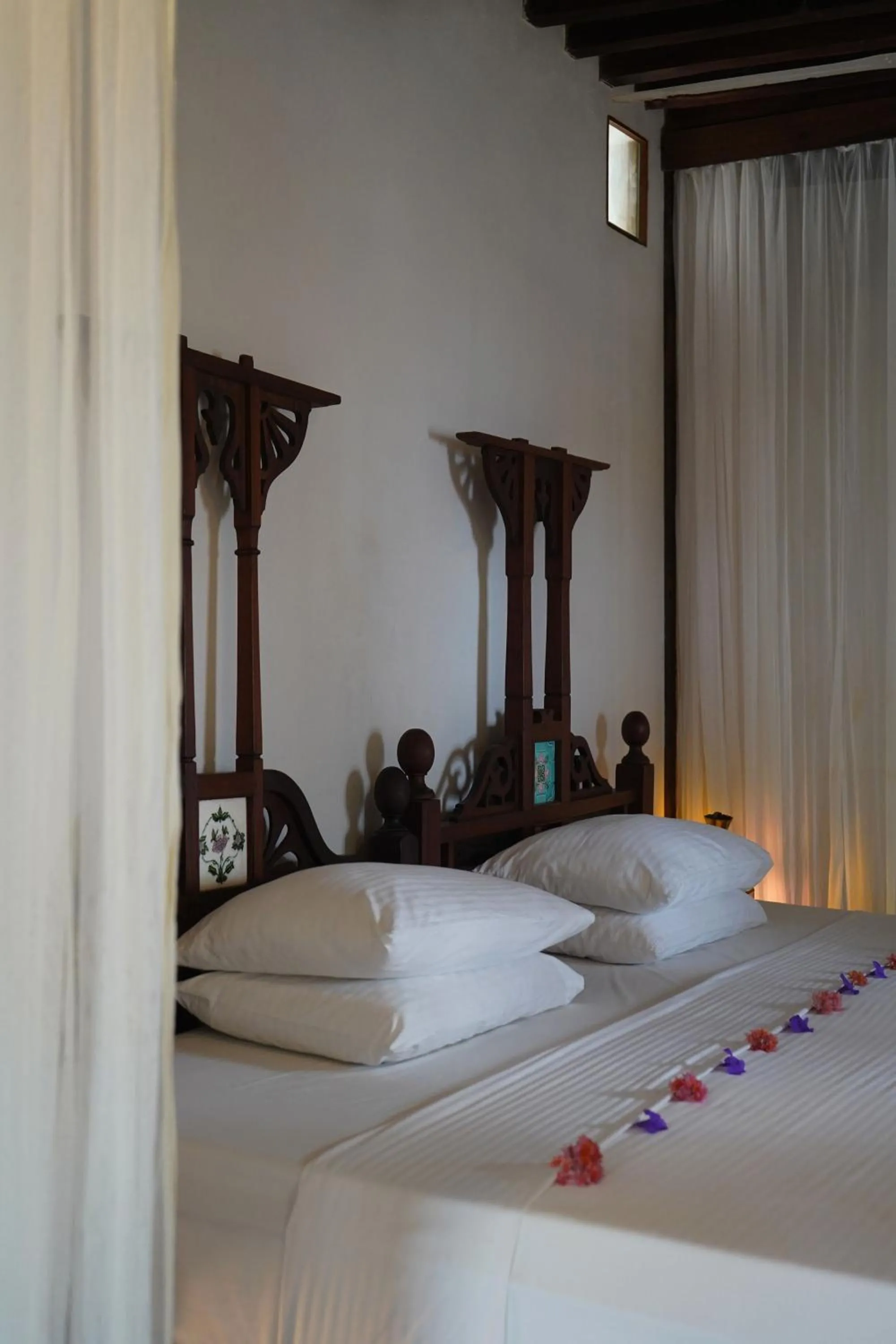 Bed in Kijani Hotel