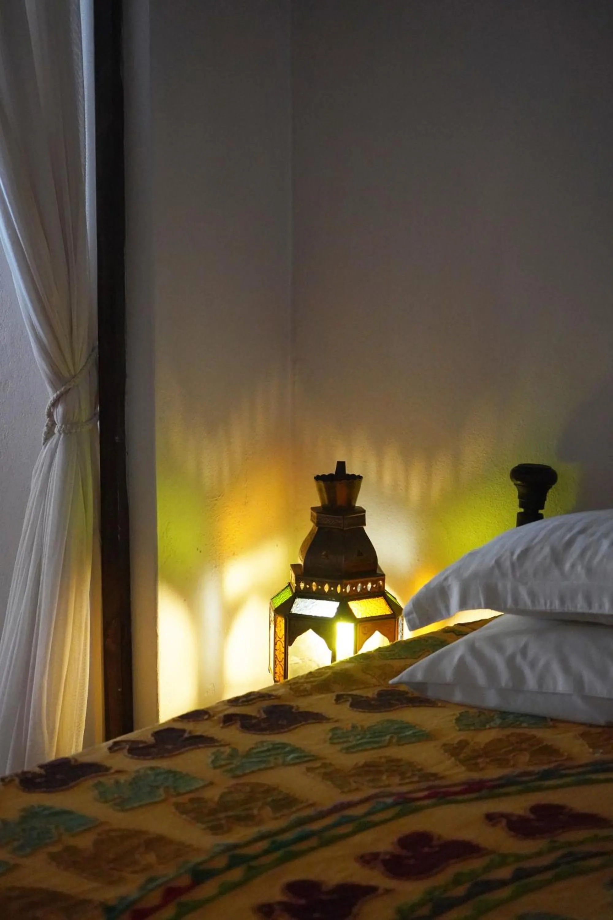 Bed in Kijani Hotel