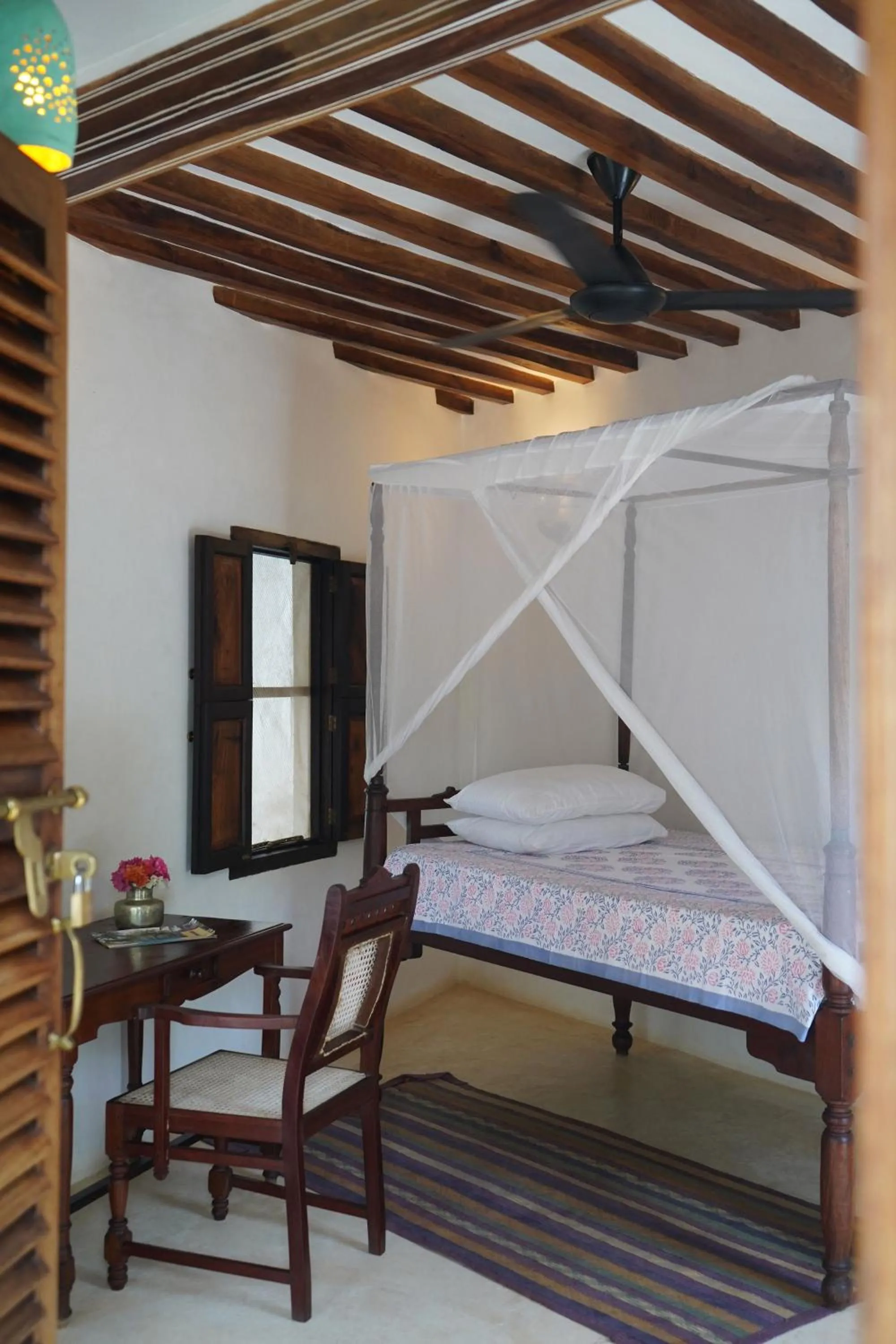 Bed in Kijani Hotel