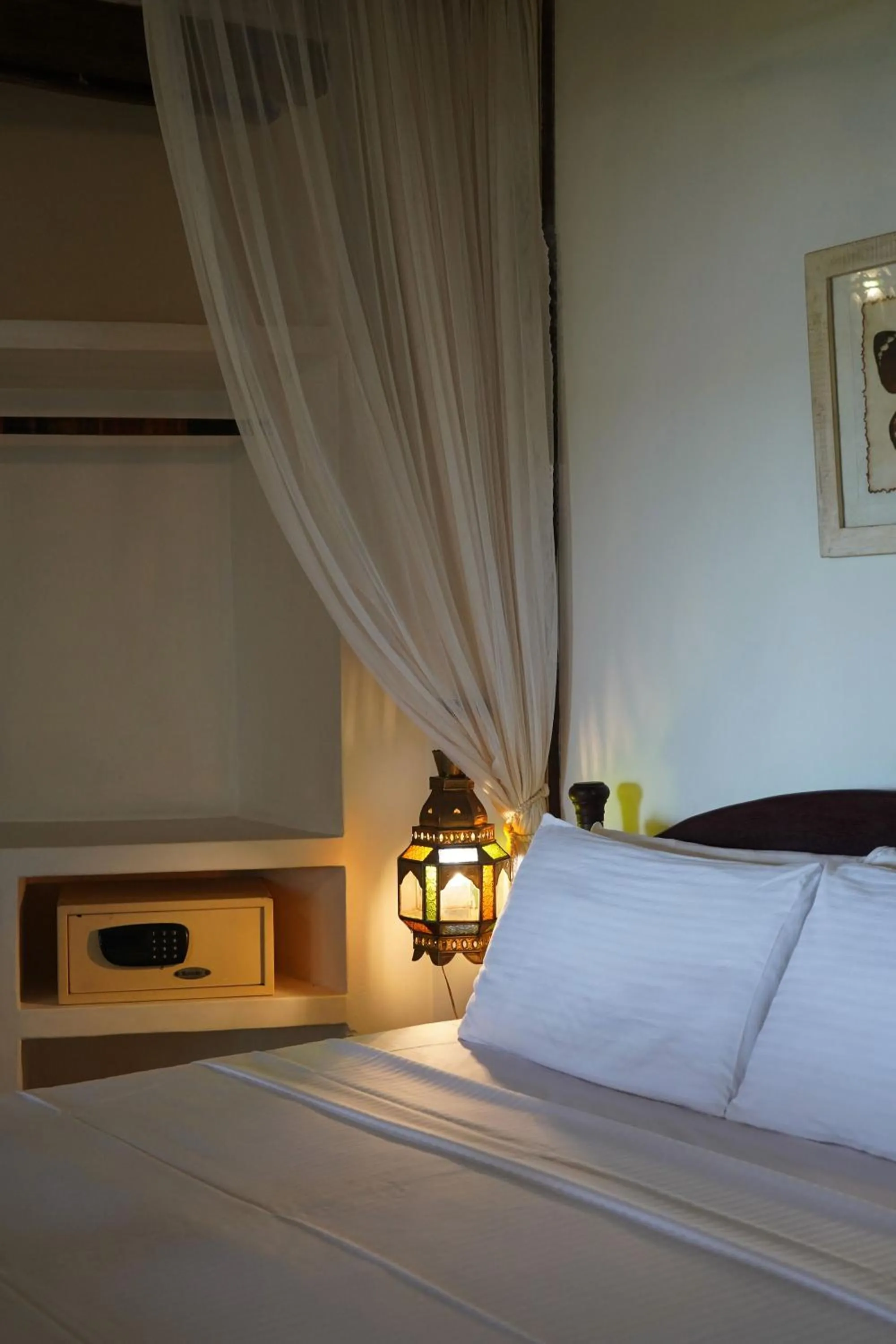 Bed in Kijani Hotel