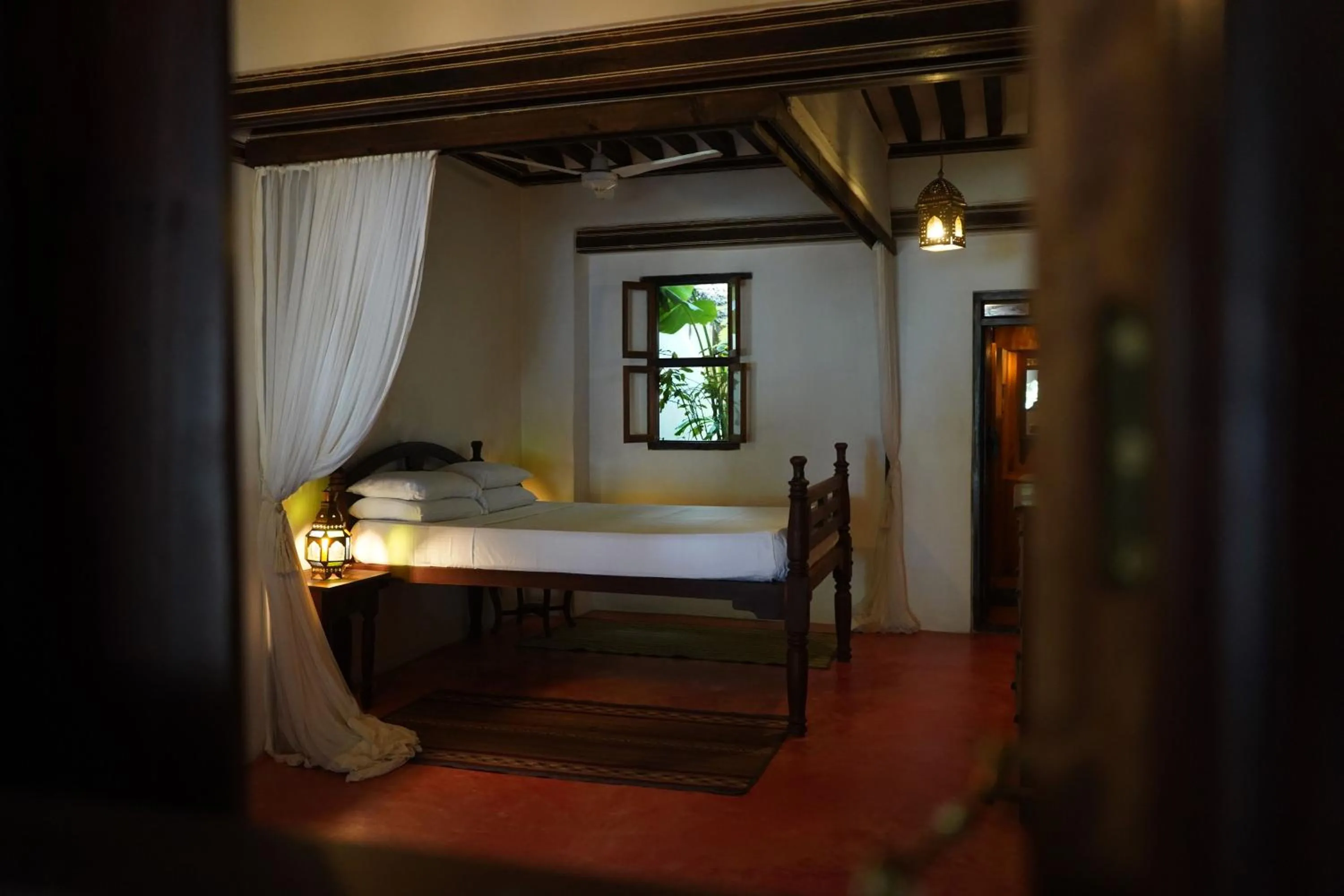 Bed in Kijani Hotel