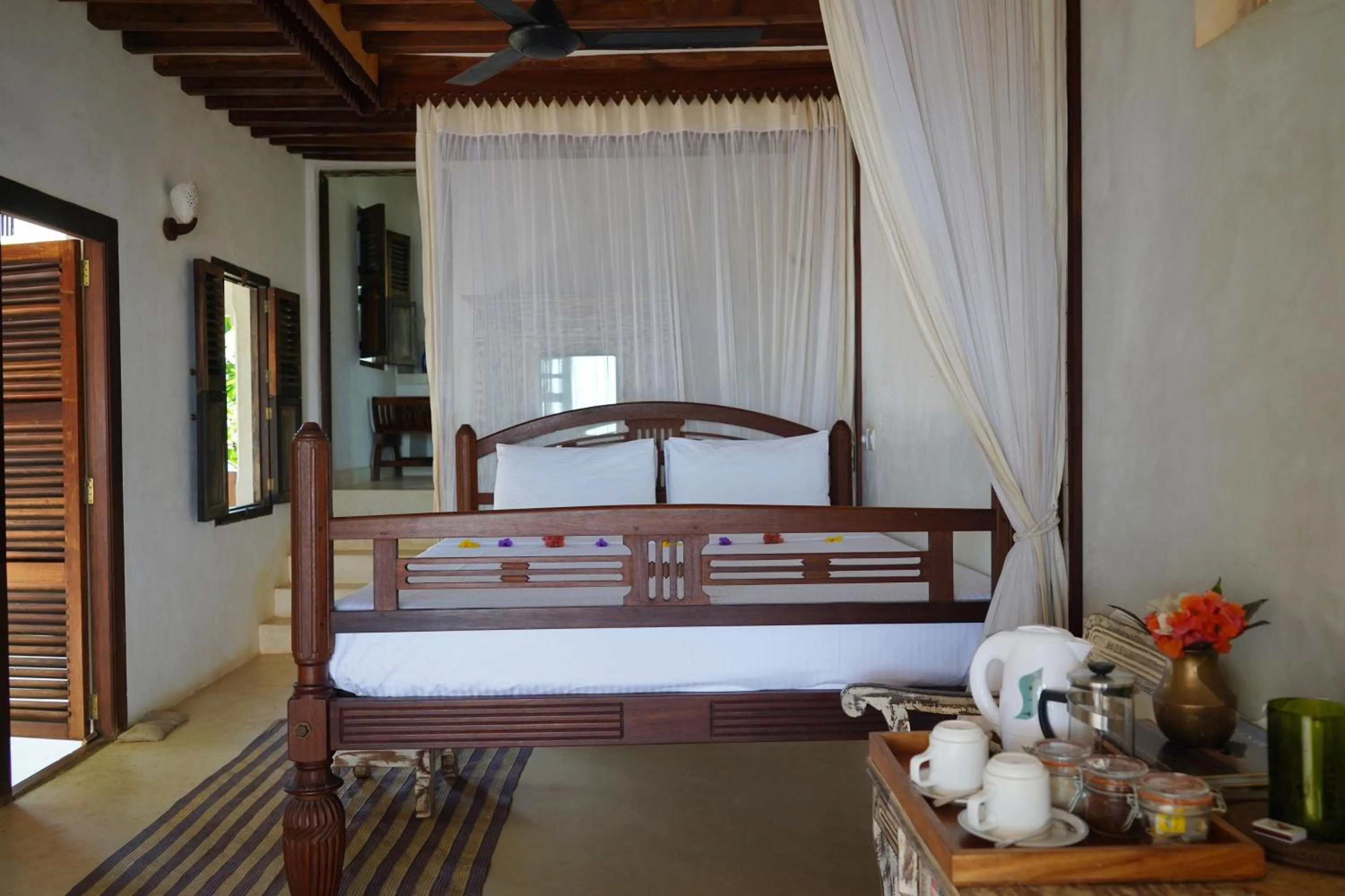 Bed in Kijani Hotel