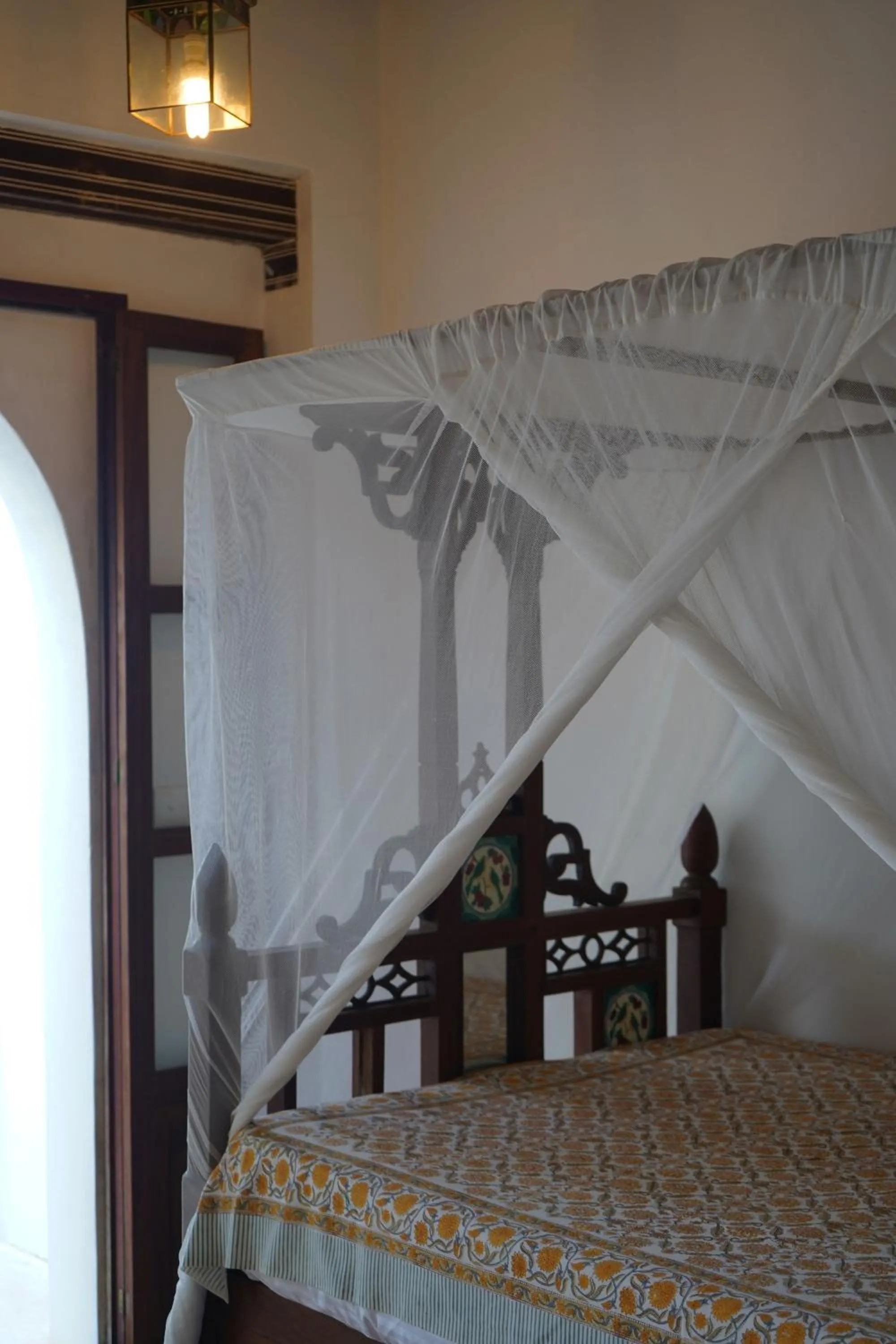 Bed in Kijani Hotel
