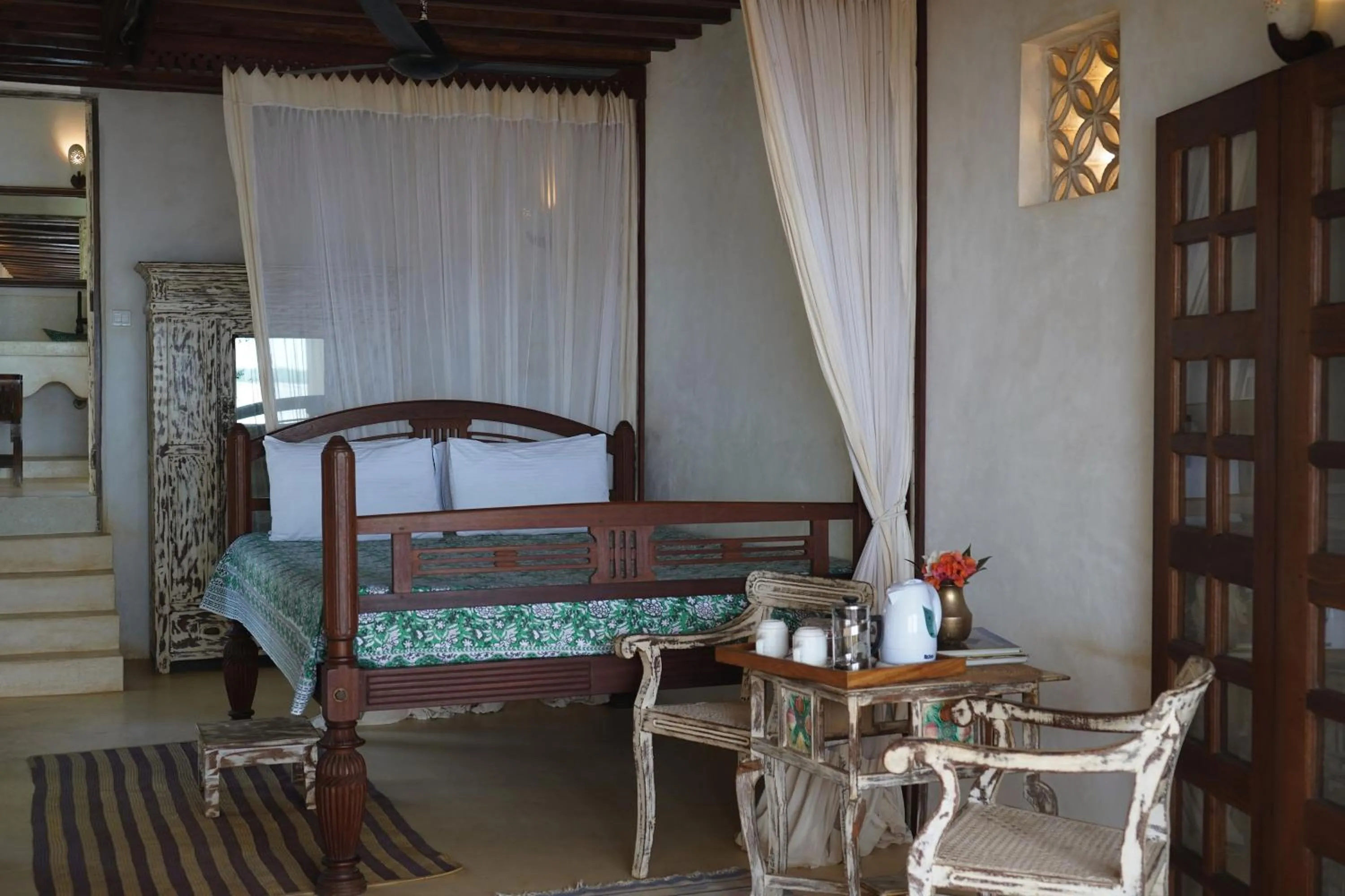 Bed in Kijani Hotel