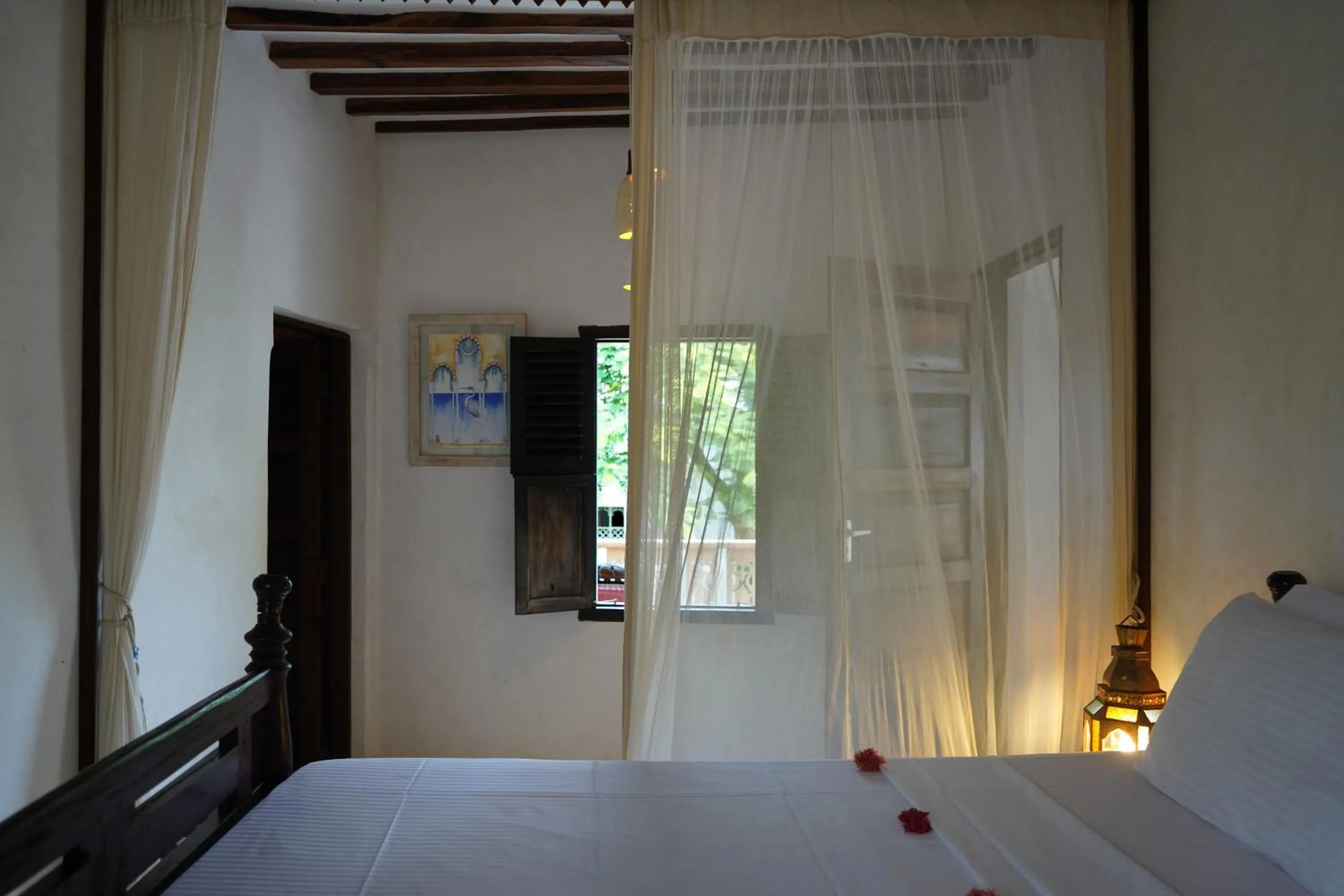 Bed in Kijani Hotel