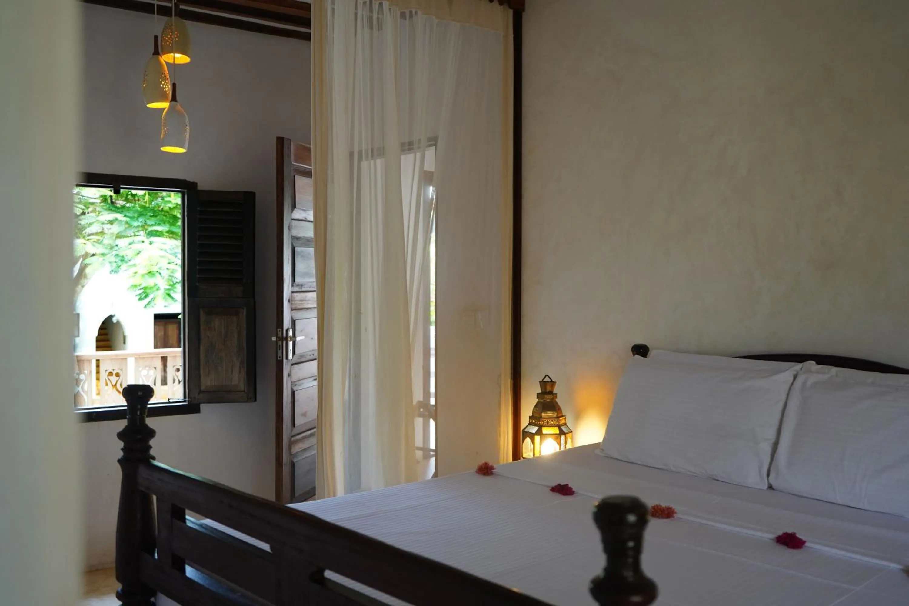 Bed in Kijani Hotel