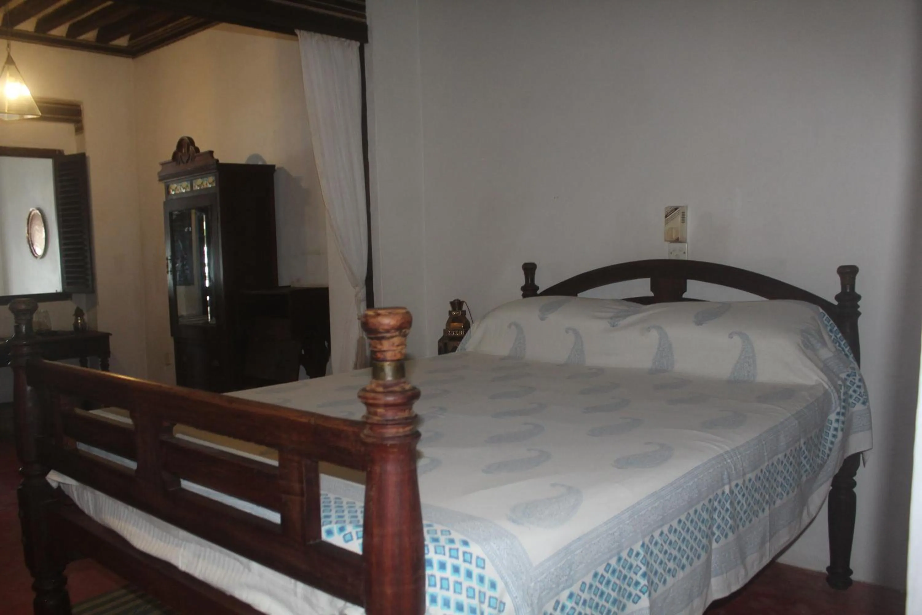 Bed in Kijani Hotel