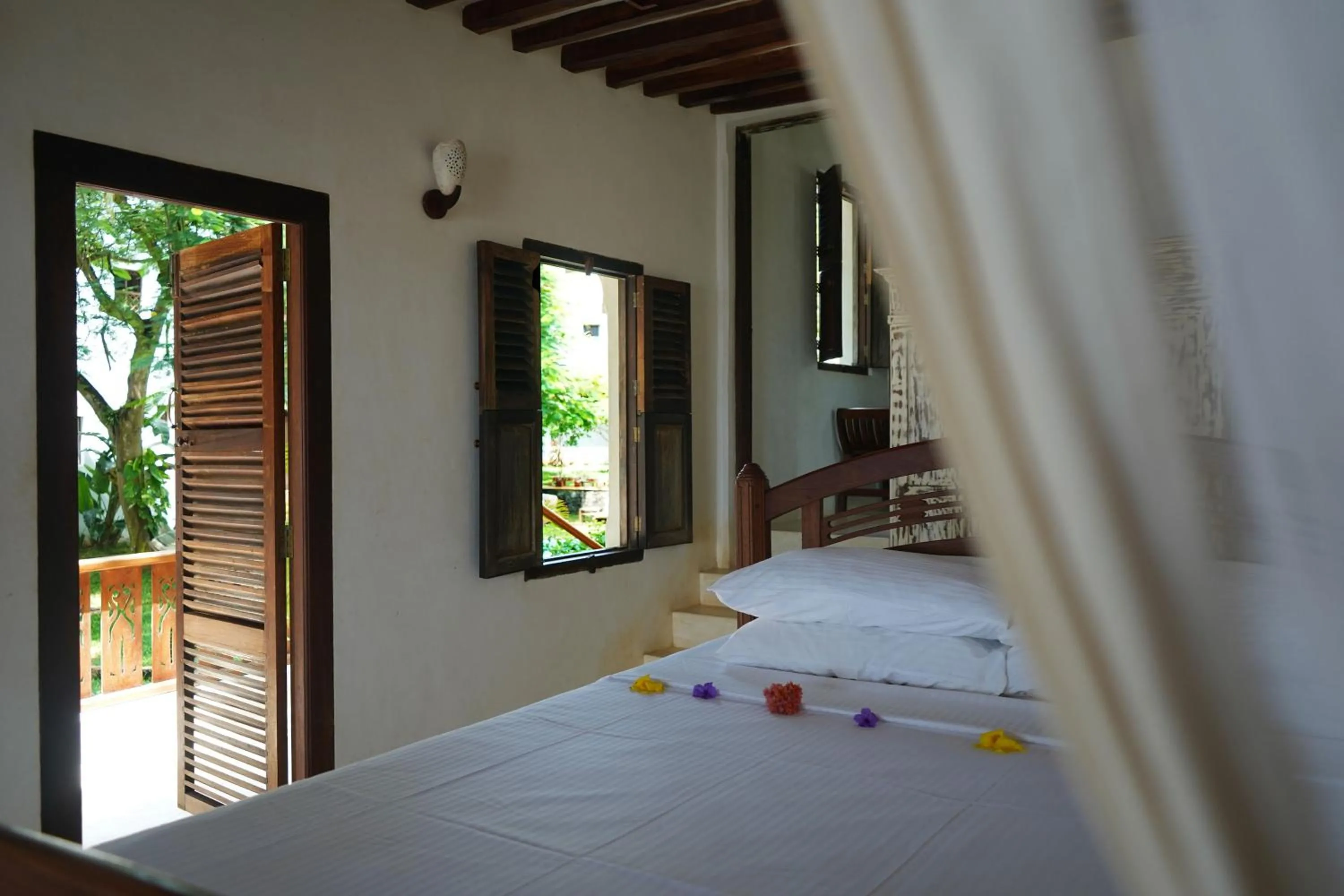 Bed in Kijani Hotel