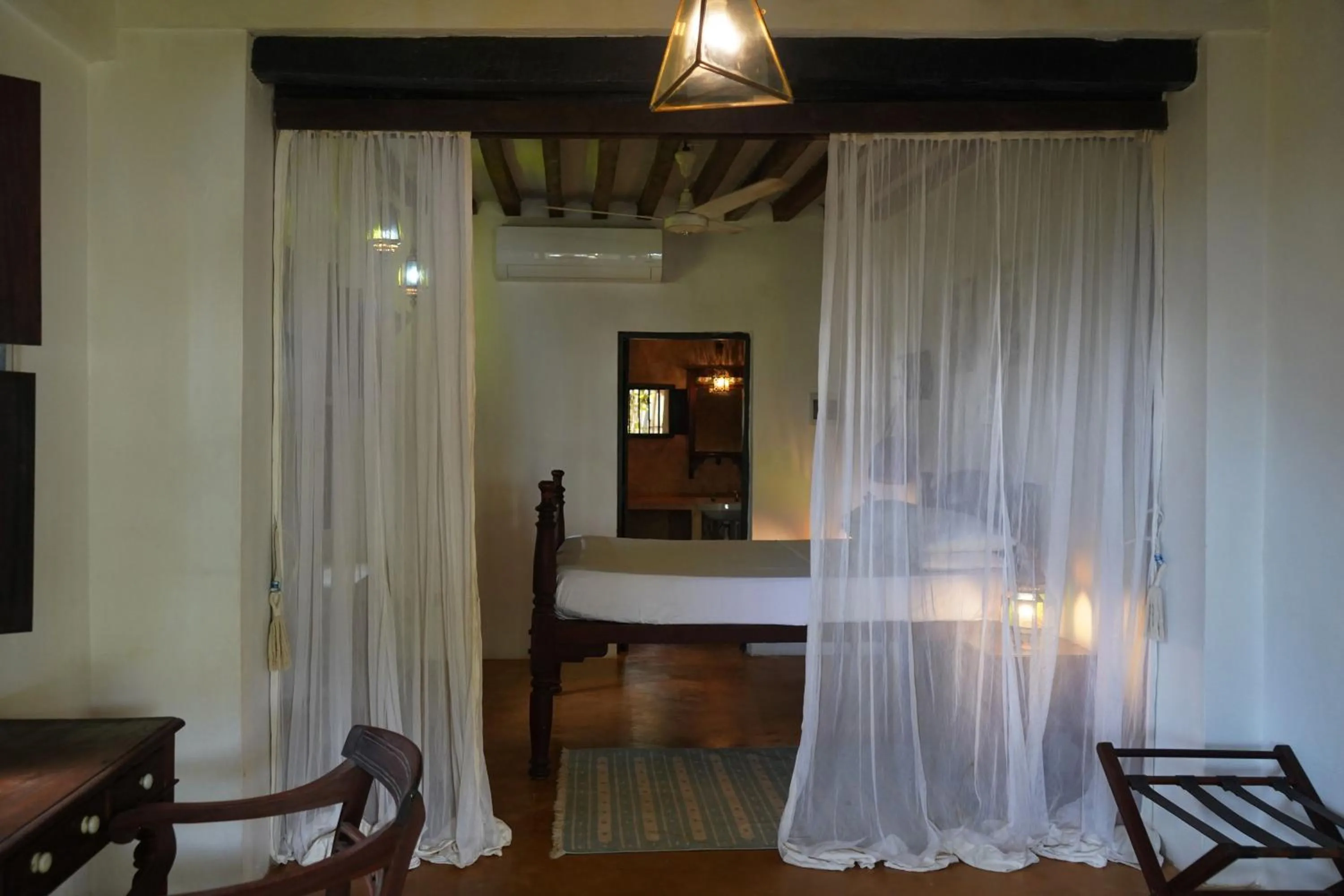 Bed in Kijani Hotel