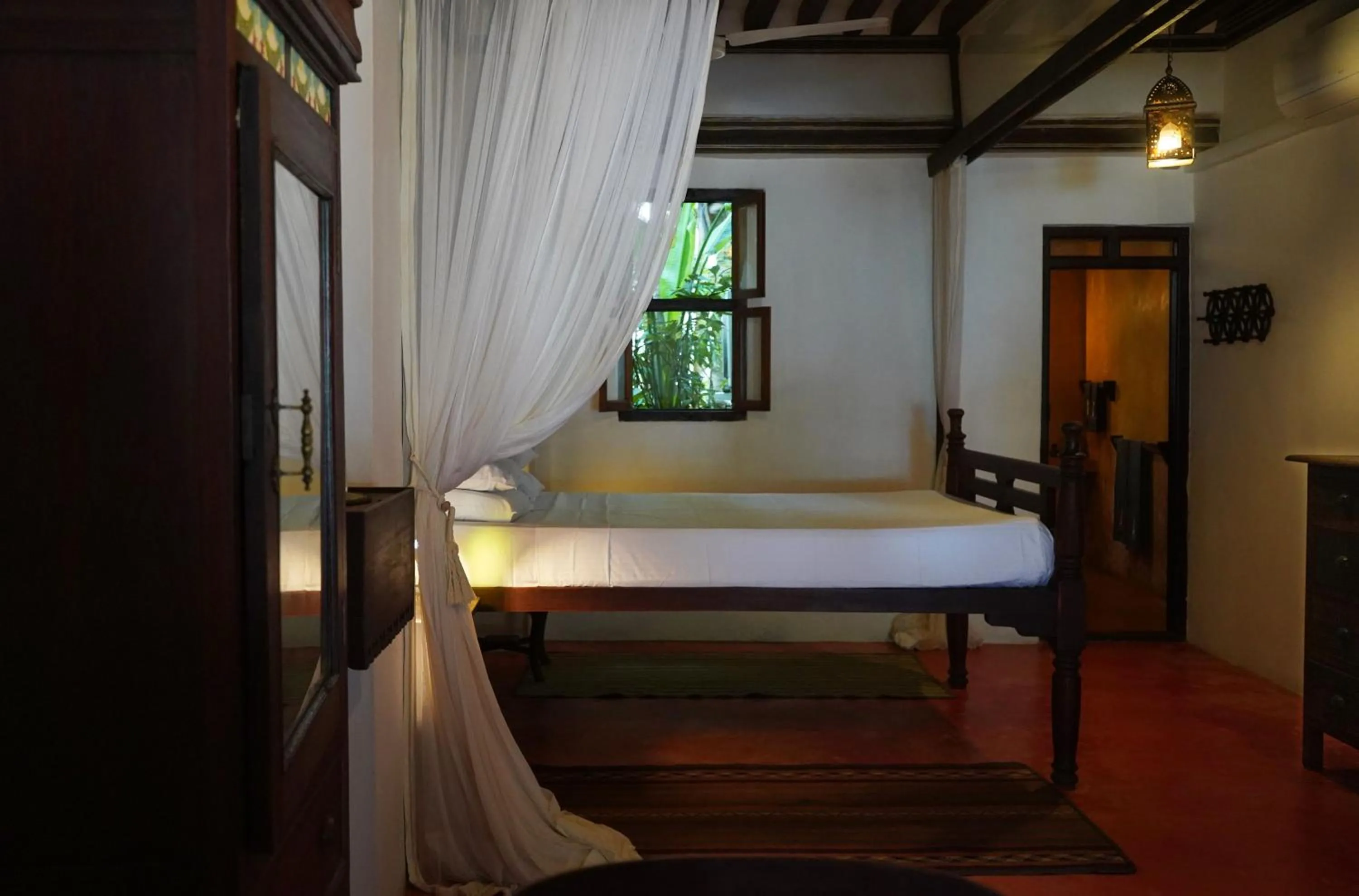 Bed in Kijani Hotel