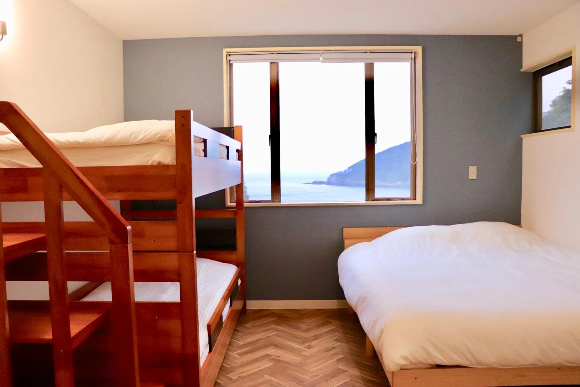 Bed in Guesthouse All you need - All rooms have an ocean view!