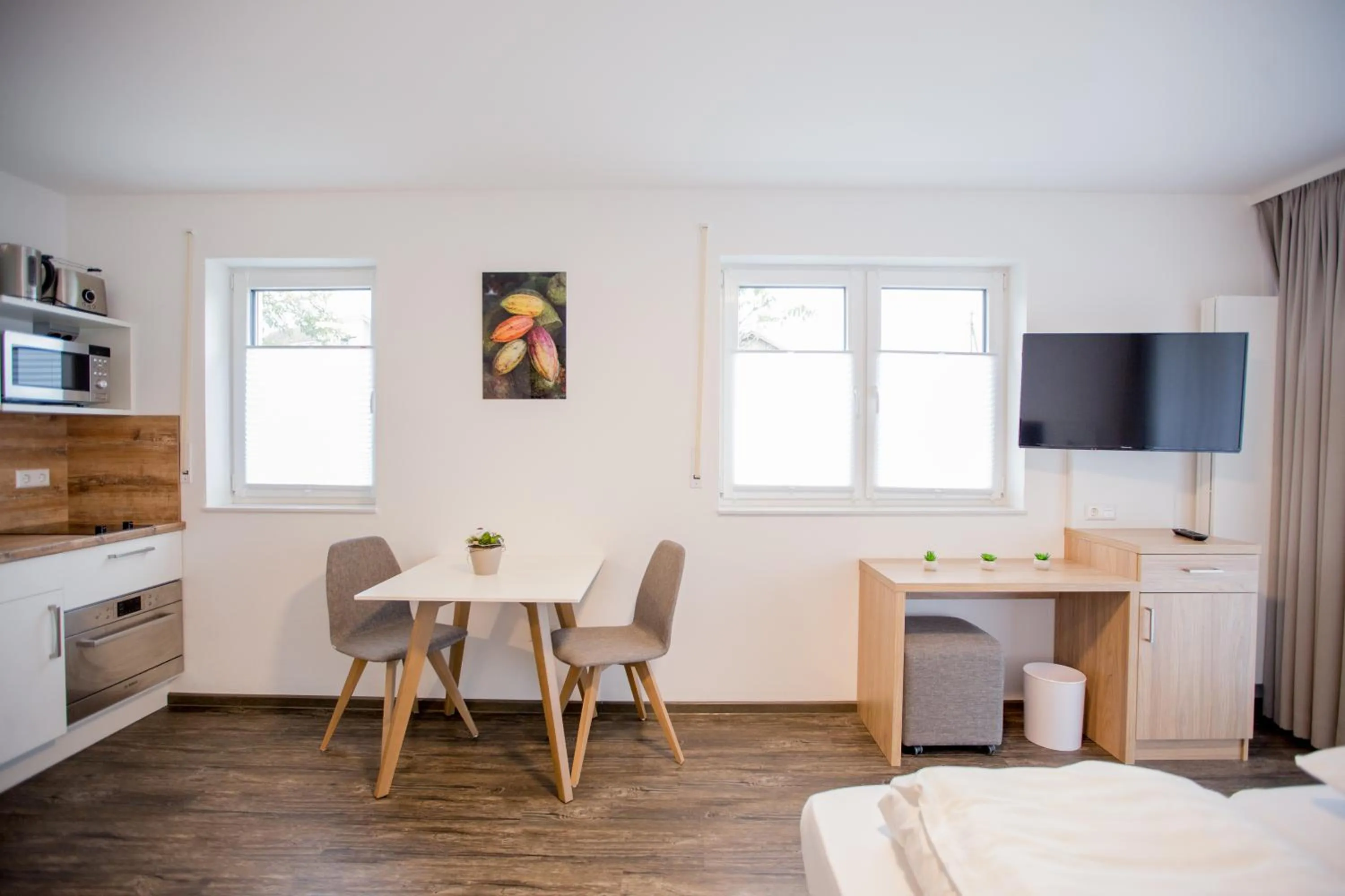 Photo of the whole room in Schoko-Apartments mit Bad & Küche