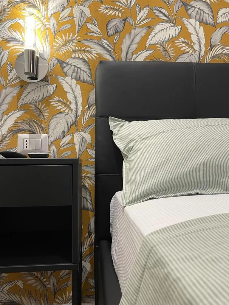 Bed in Vatican G&G Suites