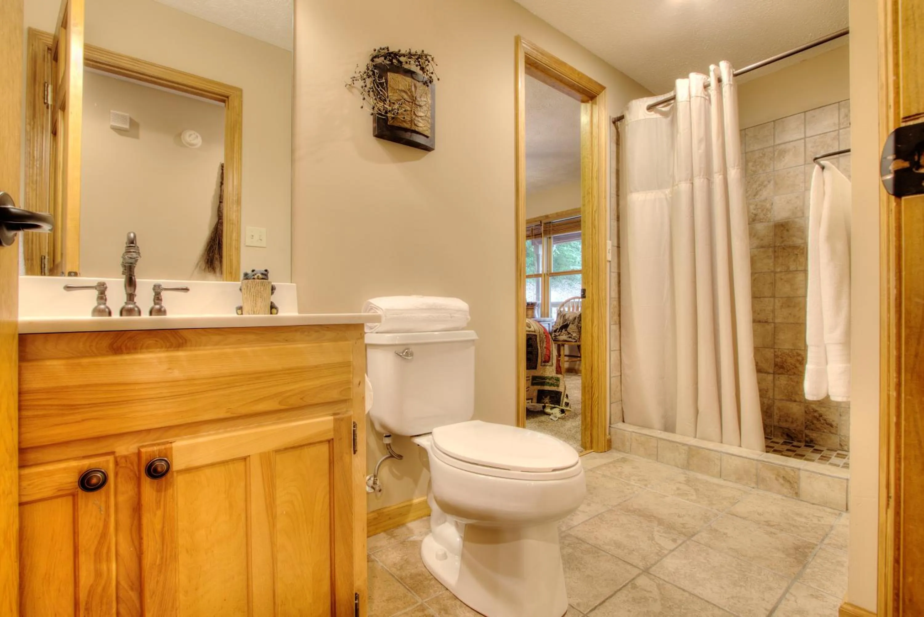 Shower in Gorgeous "Country Roads" by HoneyBearCabins 4BR 4BA, next to pool, easy drive, main strip location!