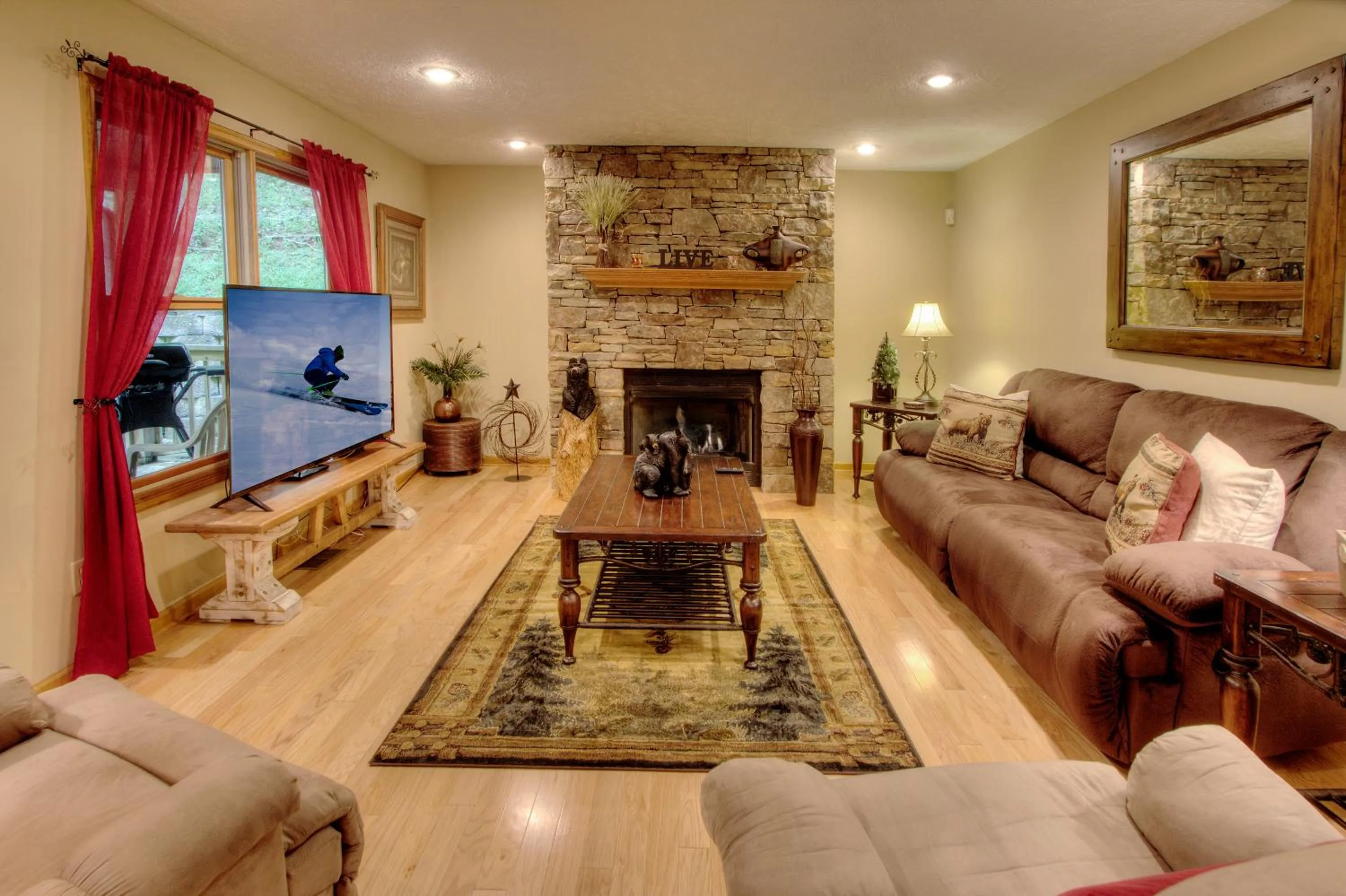 TV and multimedia in Gorgeous "Country Roads" by HoneyBearCabins 4BR 4BA, next to pool, easy drive, main strip location!