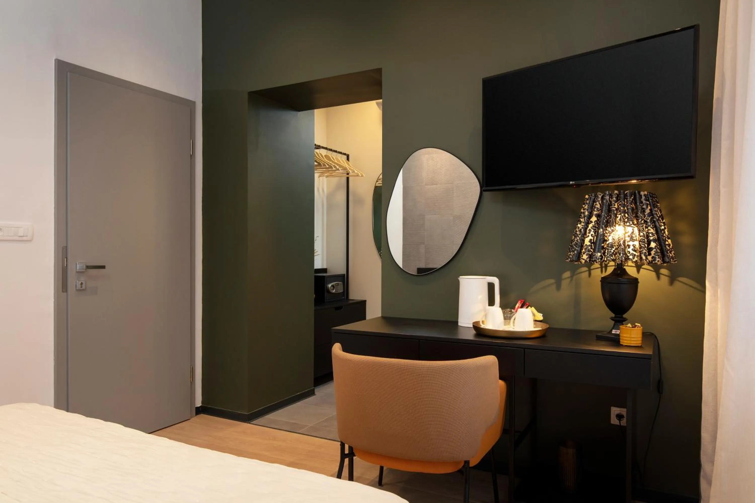 Seating area, Bed in Aborda Rooms