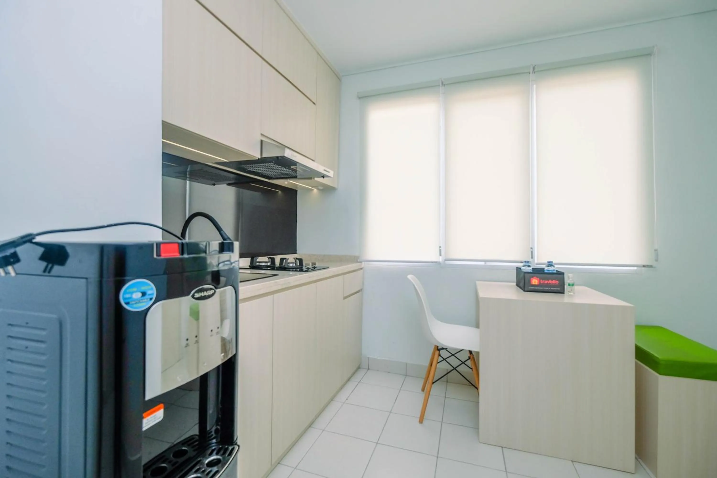 Comfy and Minimalist 1BR Patraland Urbano Apartment near Bekasi Station By Travelio