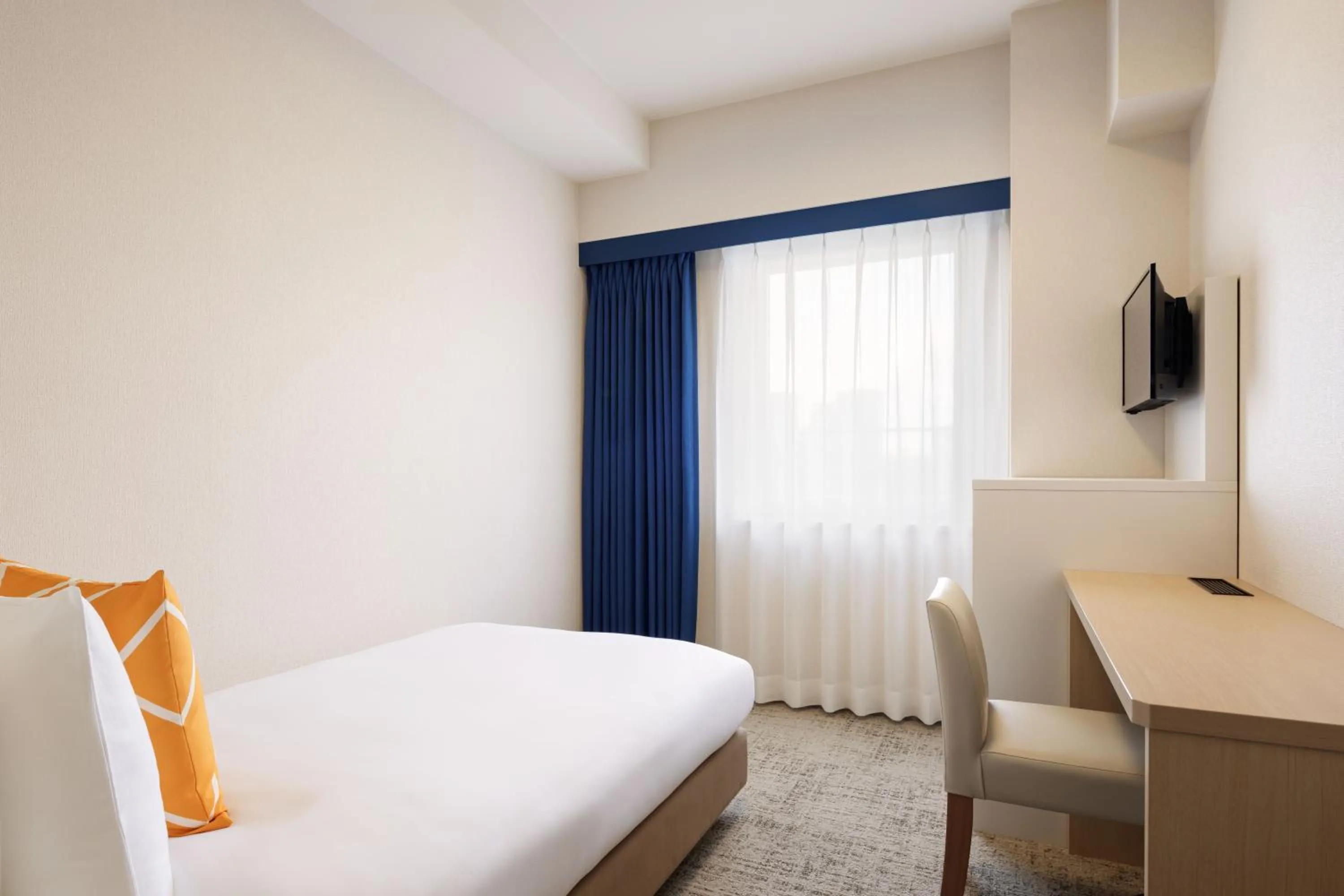 Bed in Four Points Flex by Sheraton Osaka Honmachi