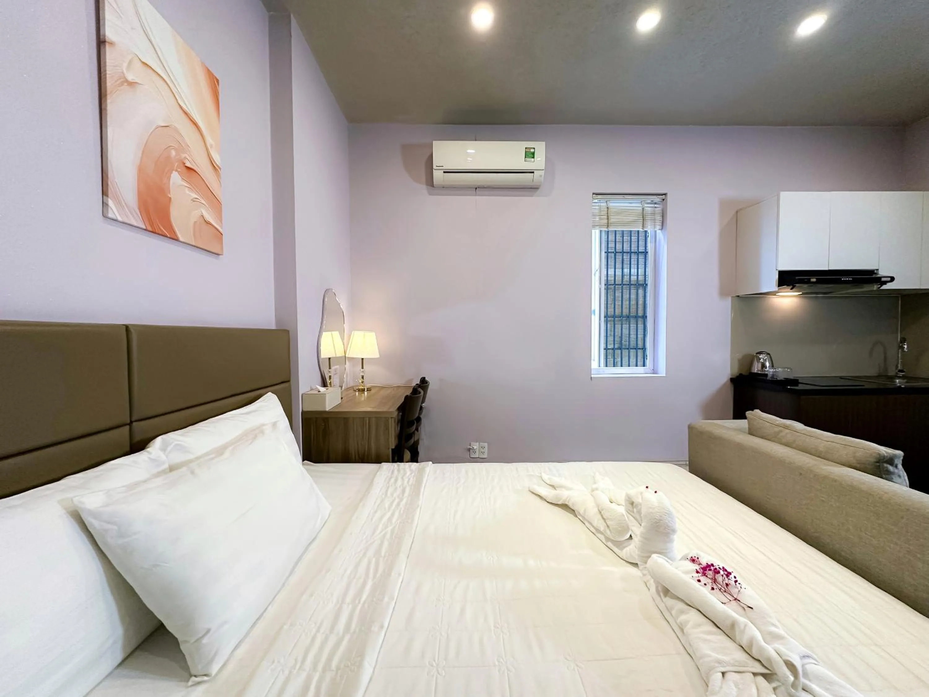 Bed in Eva Adam Hotel