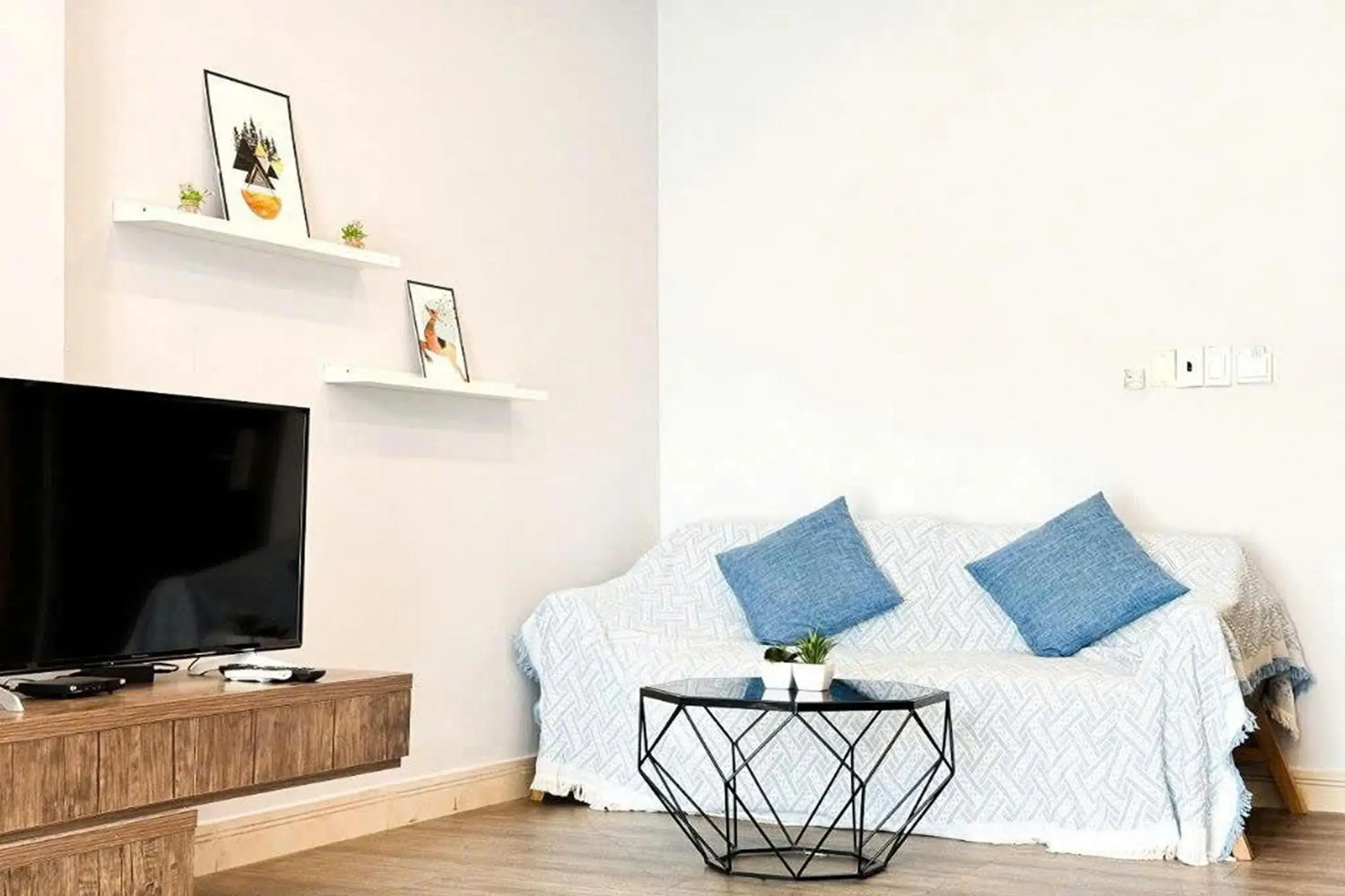 Communal lounge/ TV room in Eva Adam Hotel Communal lounge/ TV room in Eva Adam Hotel