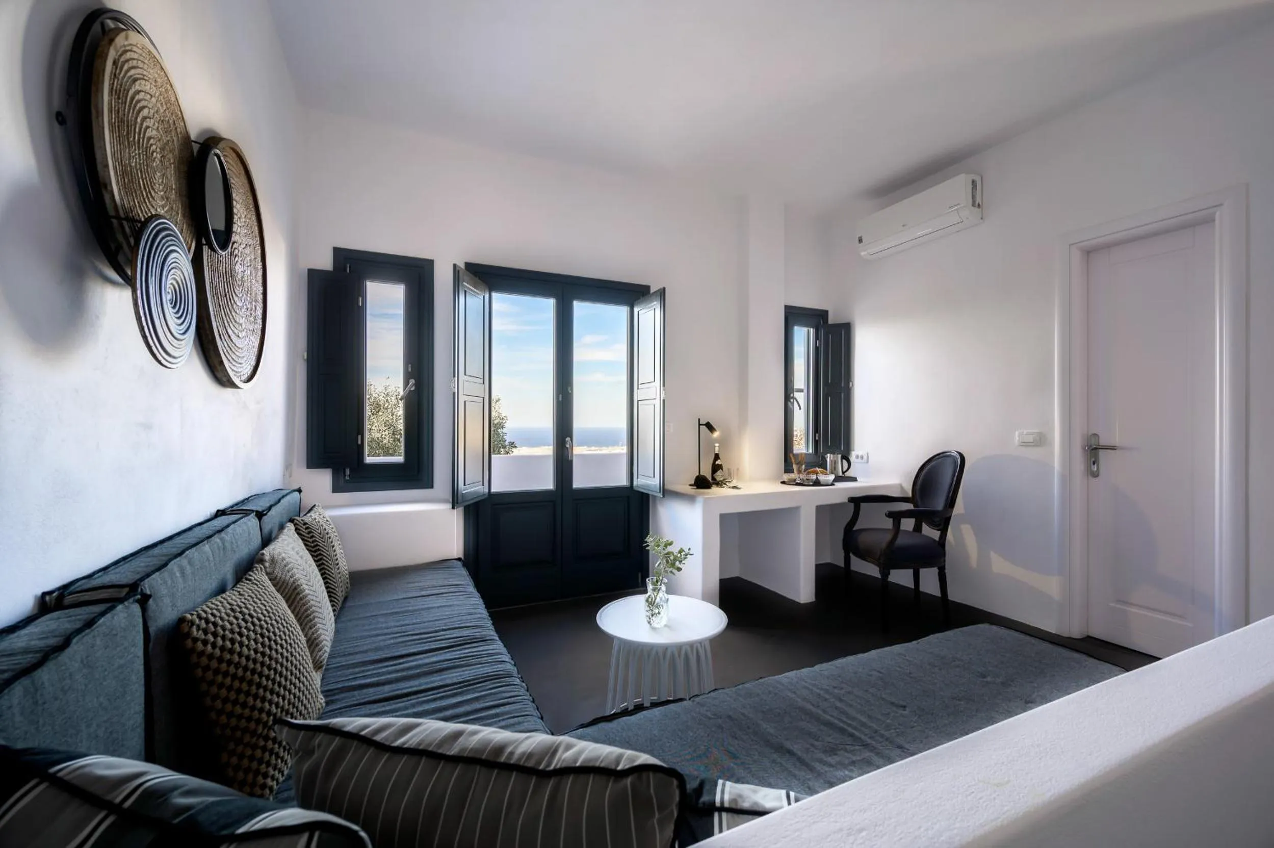 Living room, Bed in Santolia Art Suites