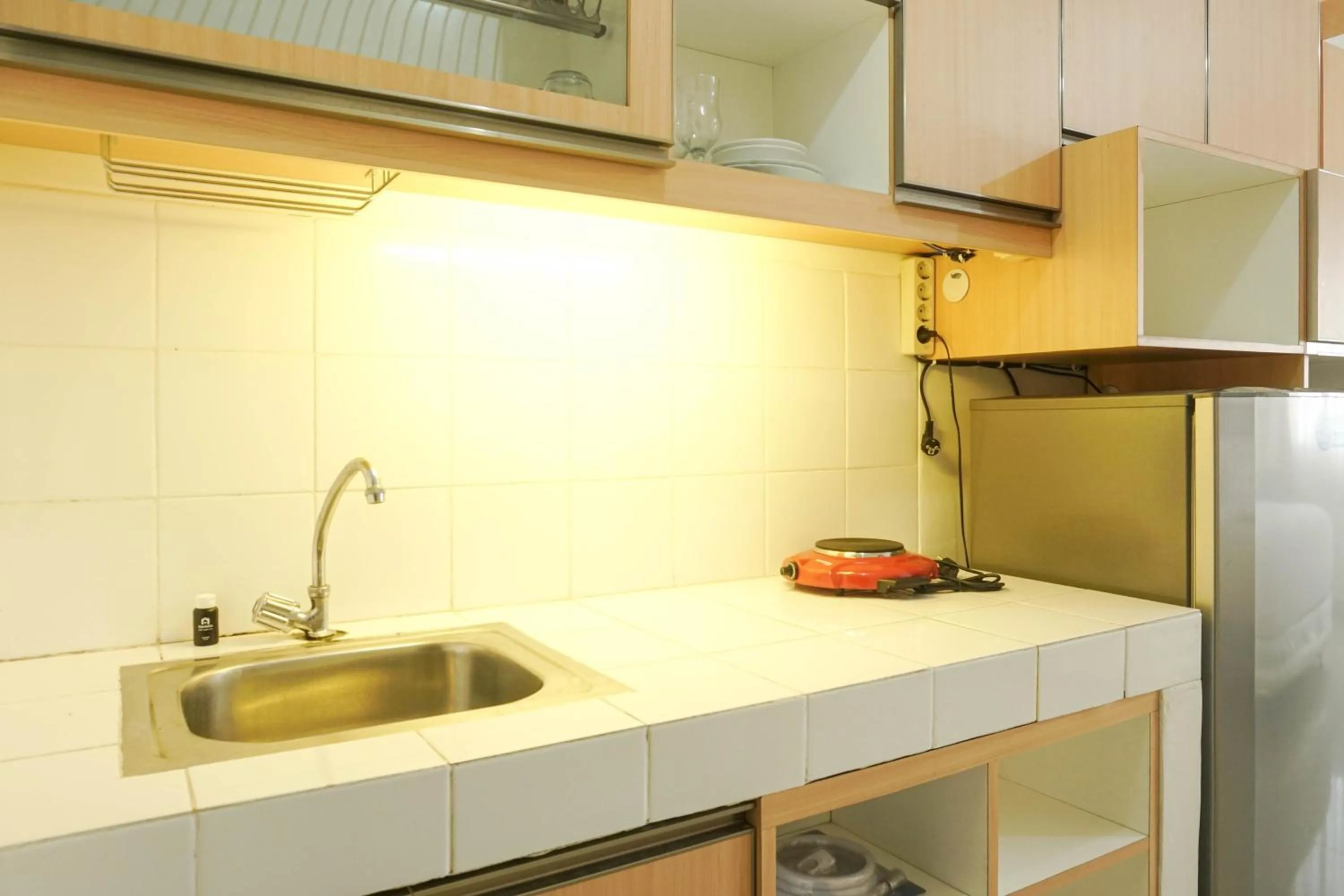 Minimalist Studio Park View Condominium Apartment near Mall By Travelio