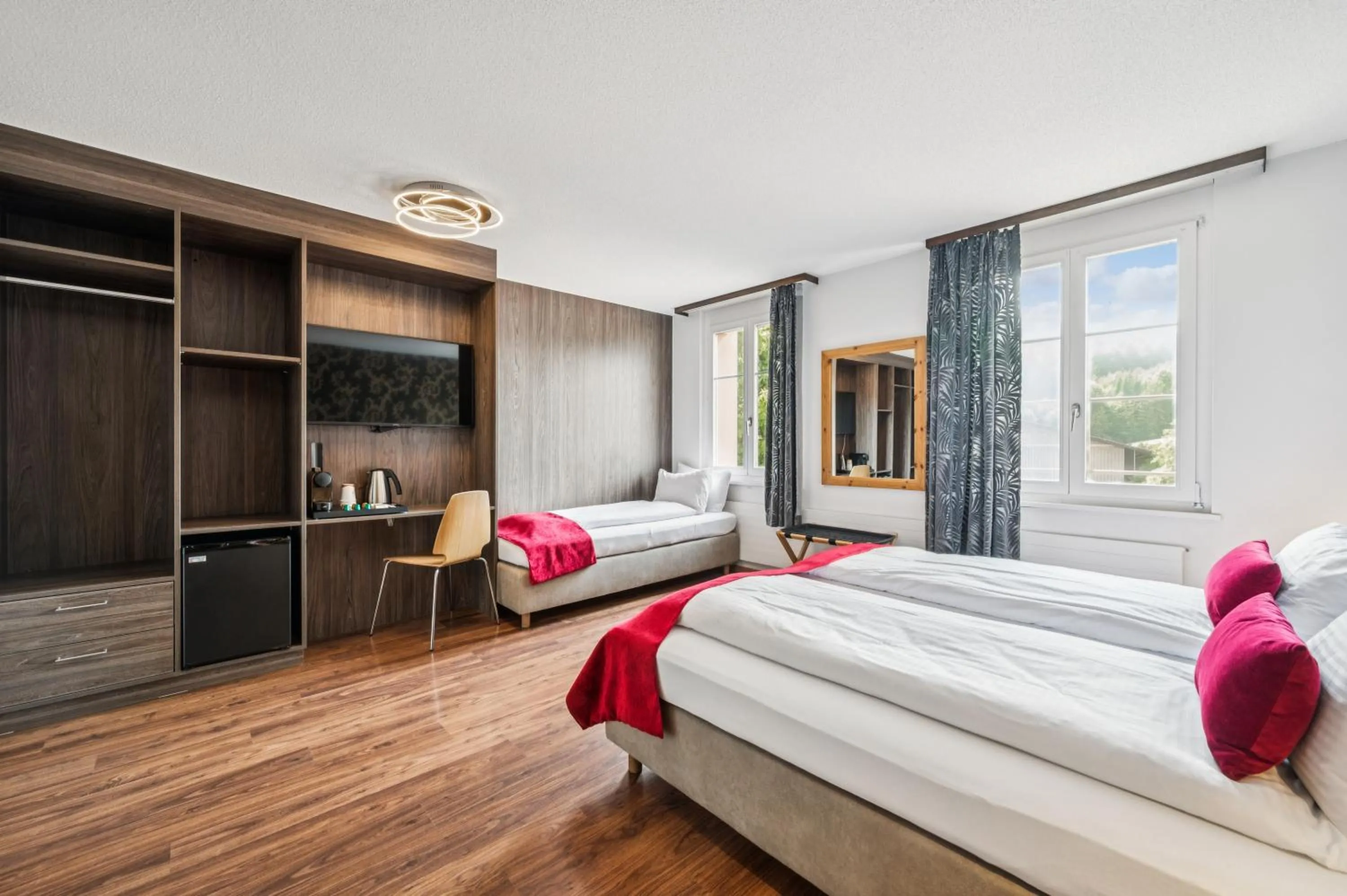 Bedroom, Bed in Hotel Sonne Interlaken-Matten