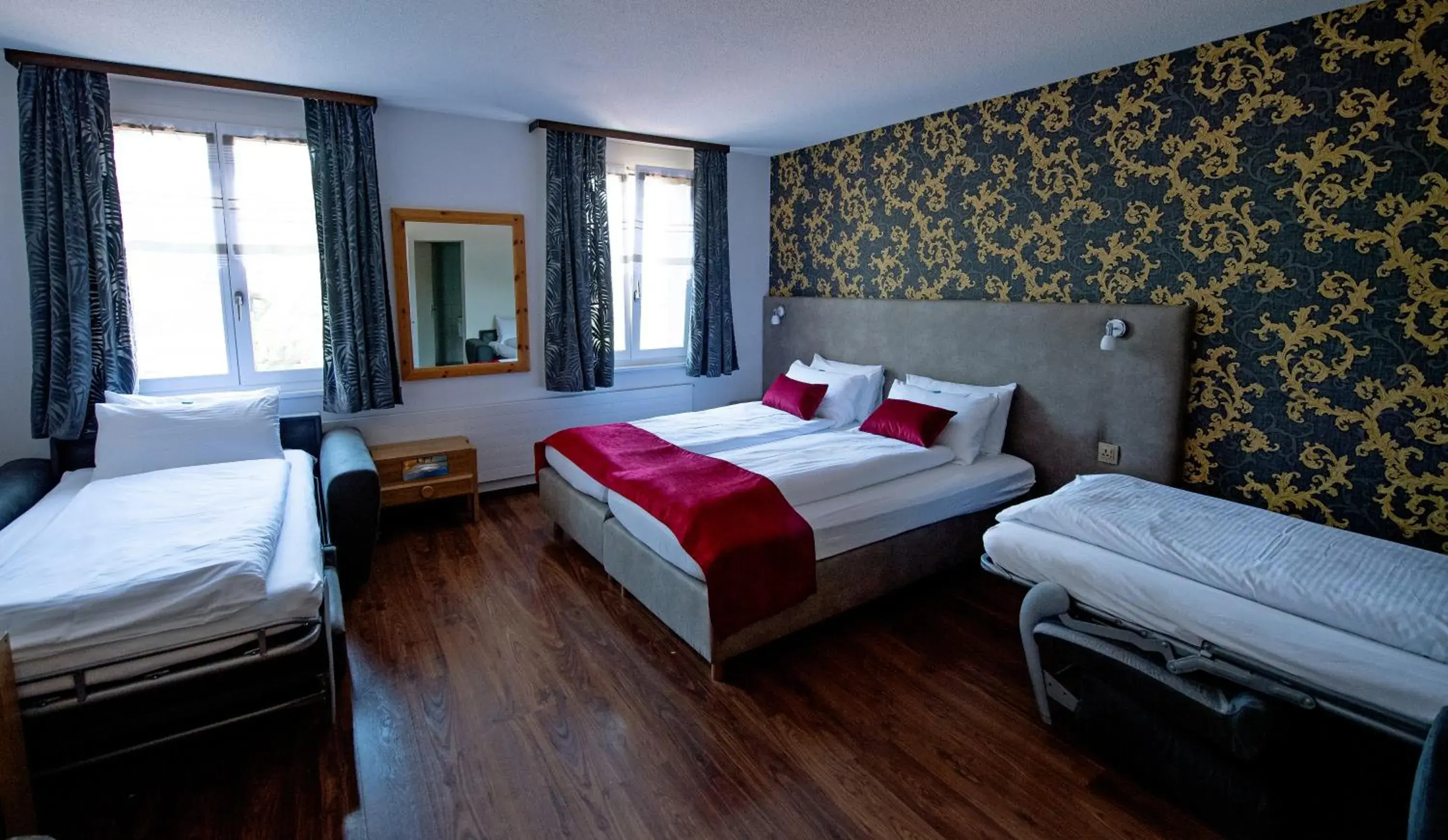 Bedroom, Bed in Hotel Sonne Interlaken-Matten