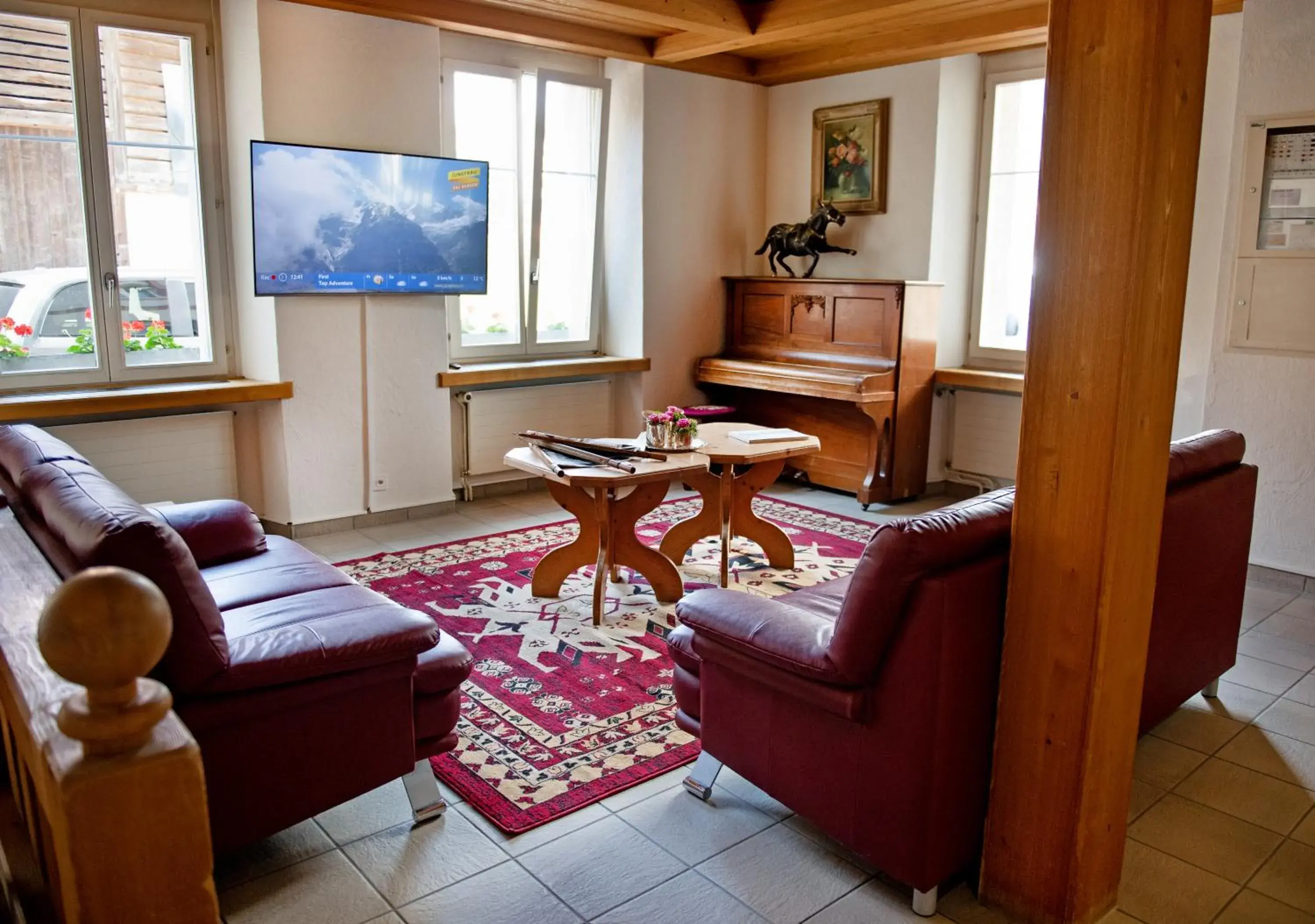 Communal lounge/ TV room, Seating Area in Hotel Sonne Interlaken-Matten