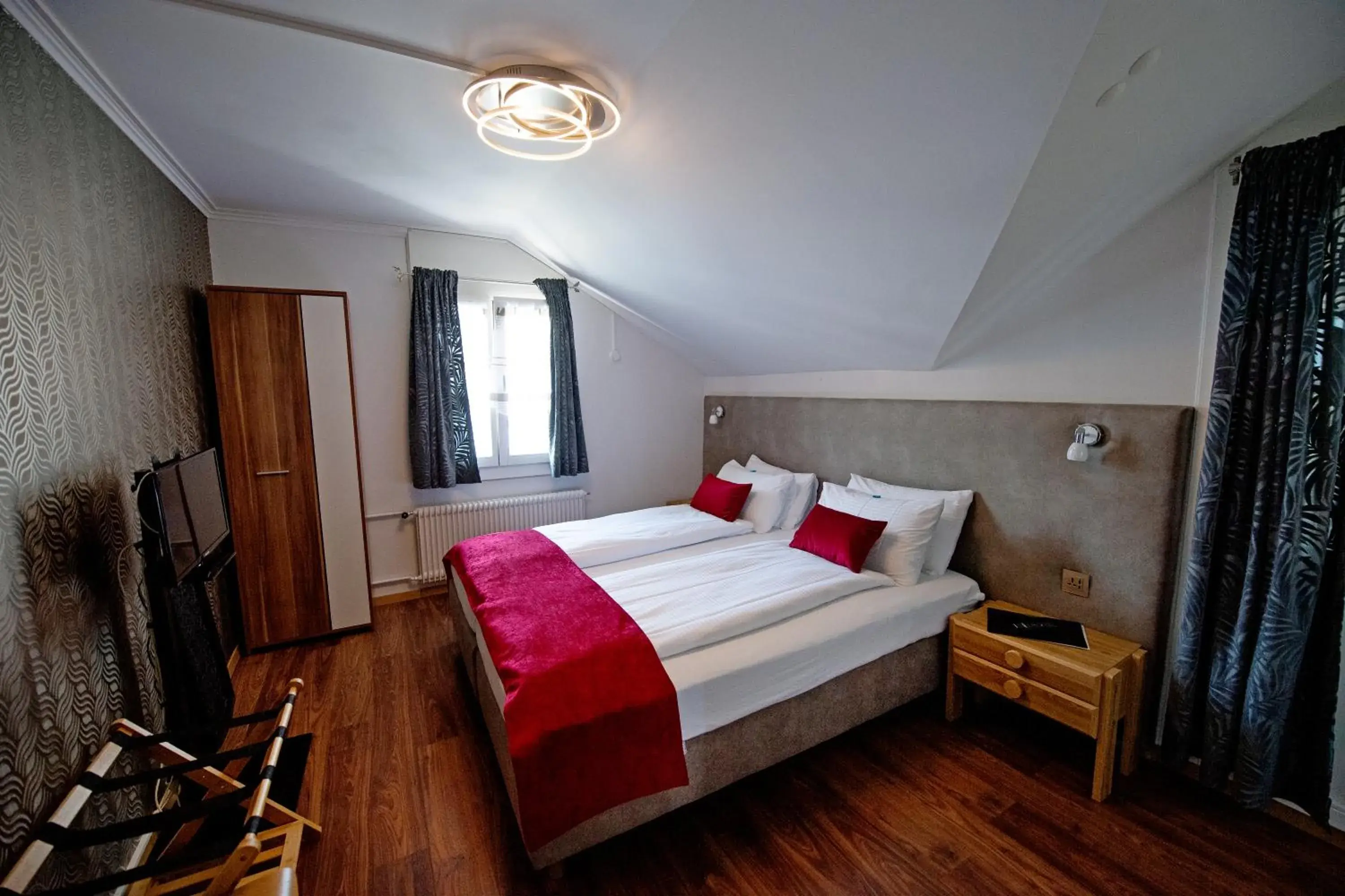 Photo of the whole room, Bed in Hotel Sonne Interlaken-Matten