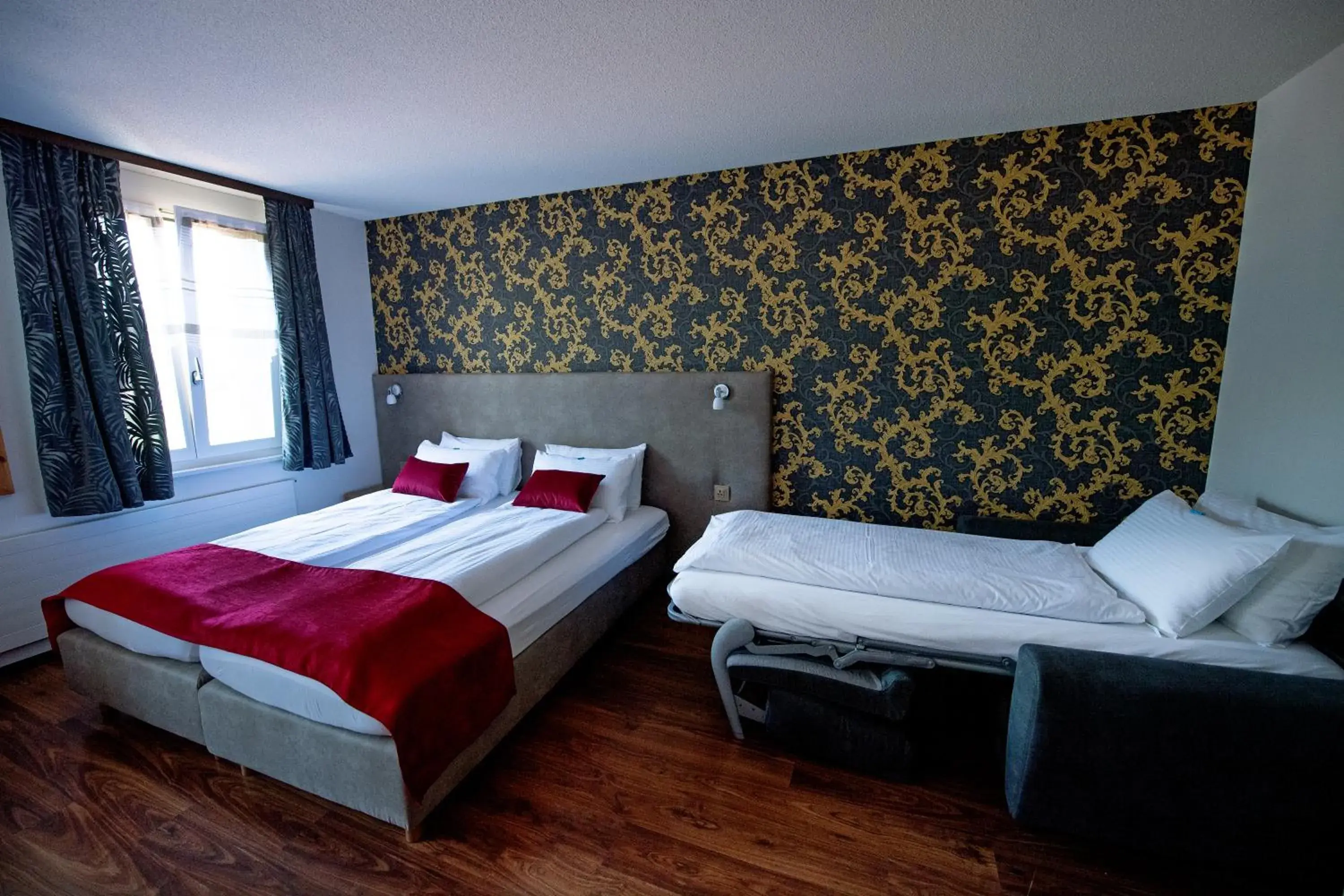 Photo of the whole room, Bed in Hotel Sonne Interlaken-Matten