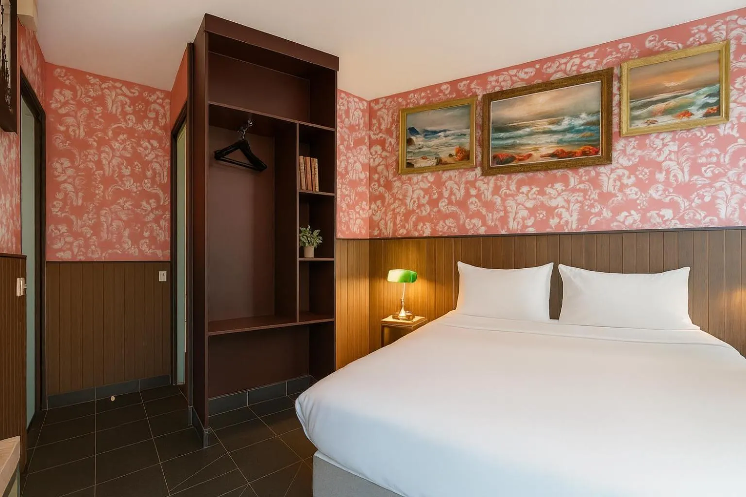 Bed in Walled off Hotel Paris