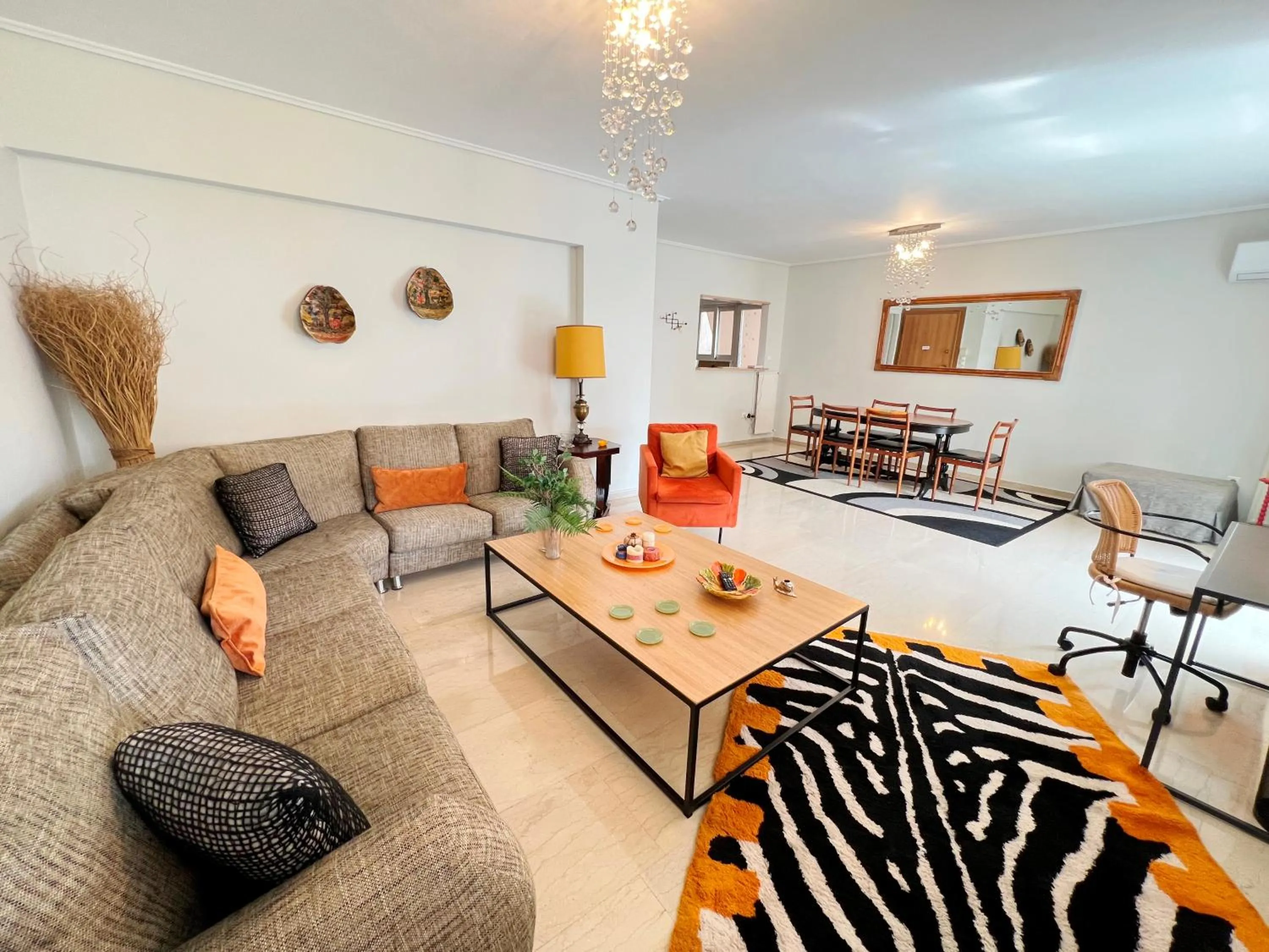 Living room in Peaceful Apartment by Flisvos Marina by Athenian Homes