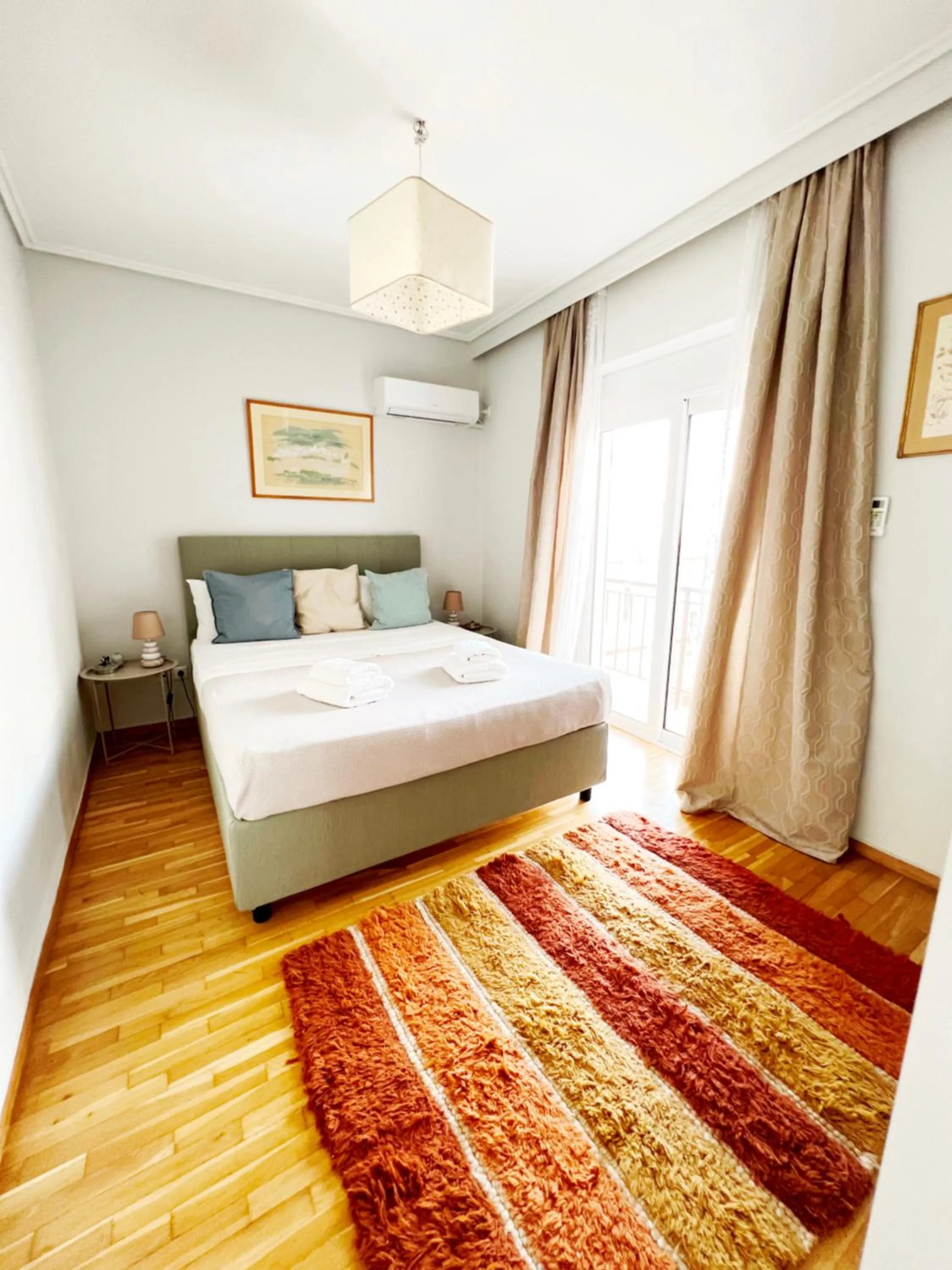 Bedroom, Bed in Peaceful Apartment by Flisvos Marina by Athenian Homes