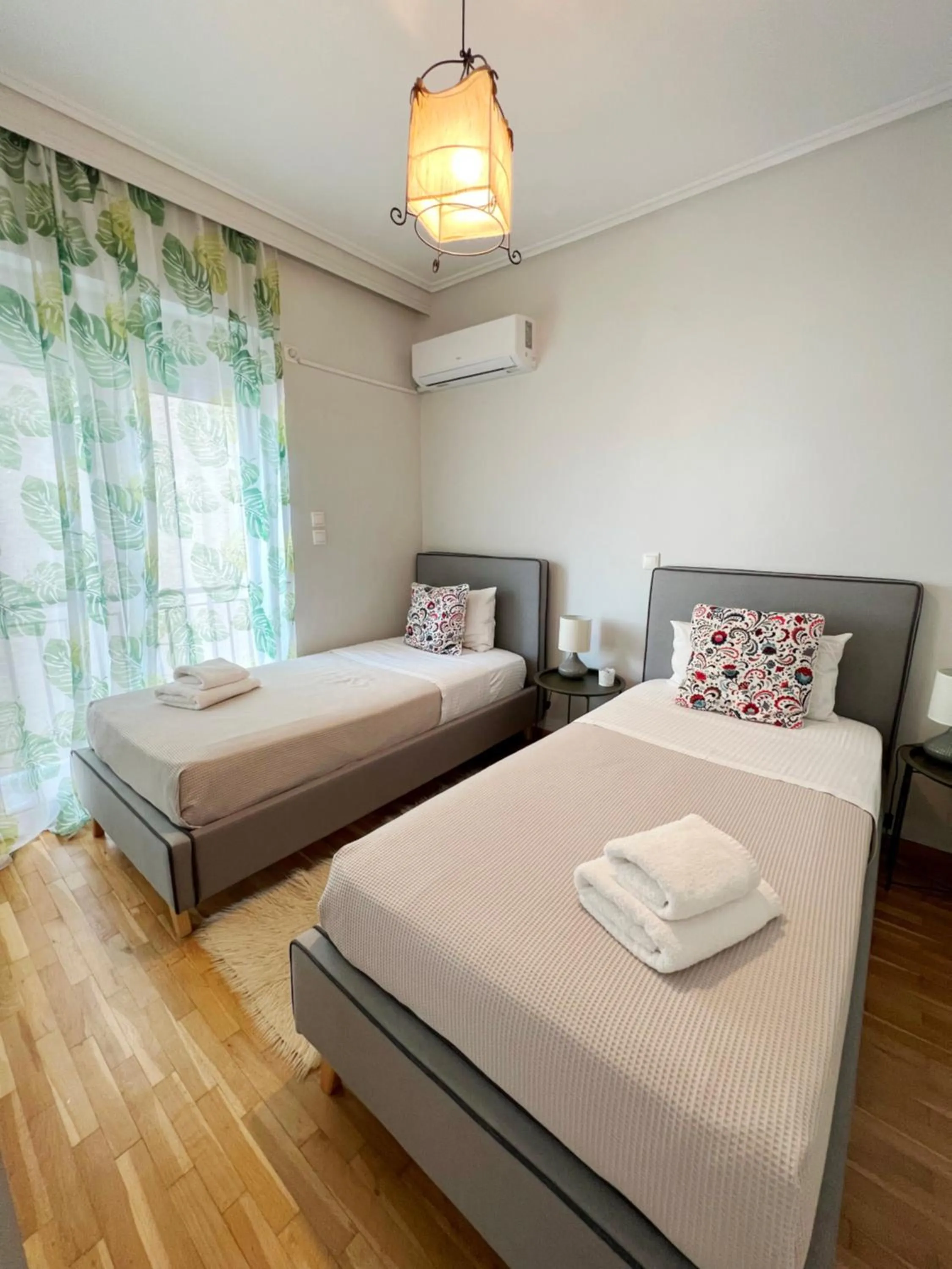 Bed in Peaceful Apartment by Flisvos Marina by Athenian Homes