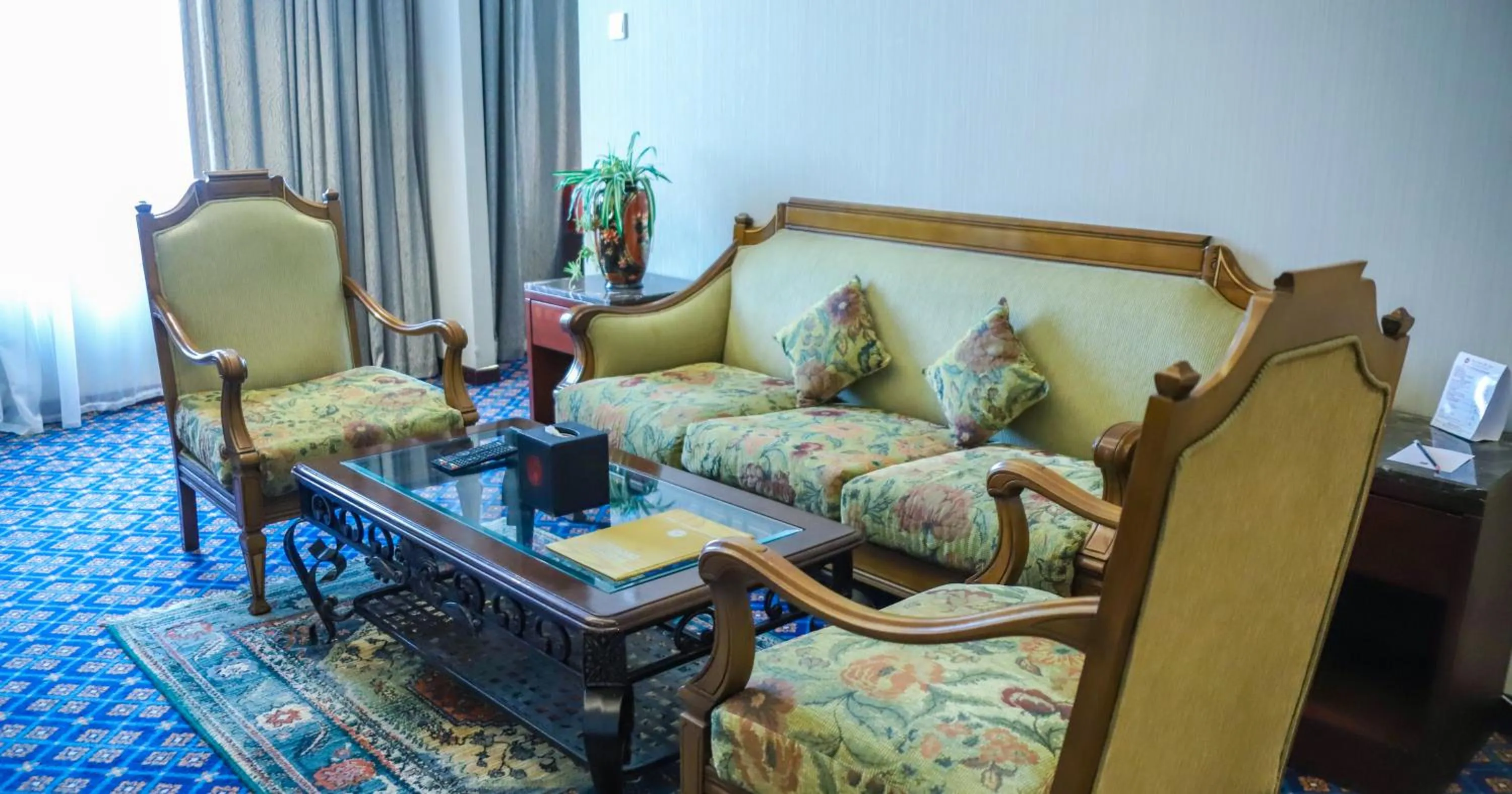 Living room, Bed in Ramee Guestline Hotel