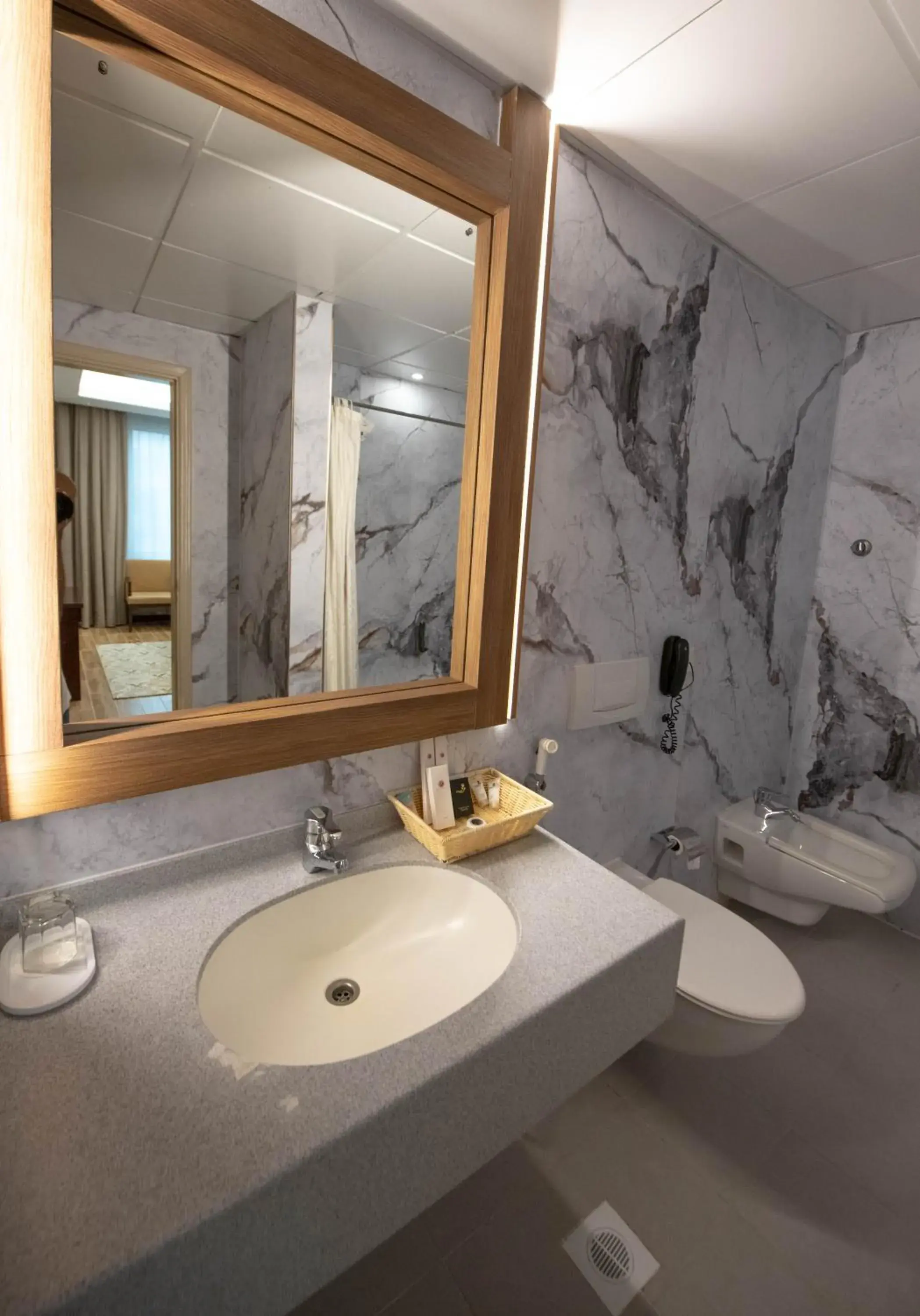 Bathroom in Ramee Guestline Hotel Bathroom in Ramee Guestline Hotel